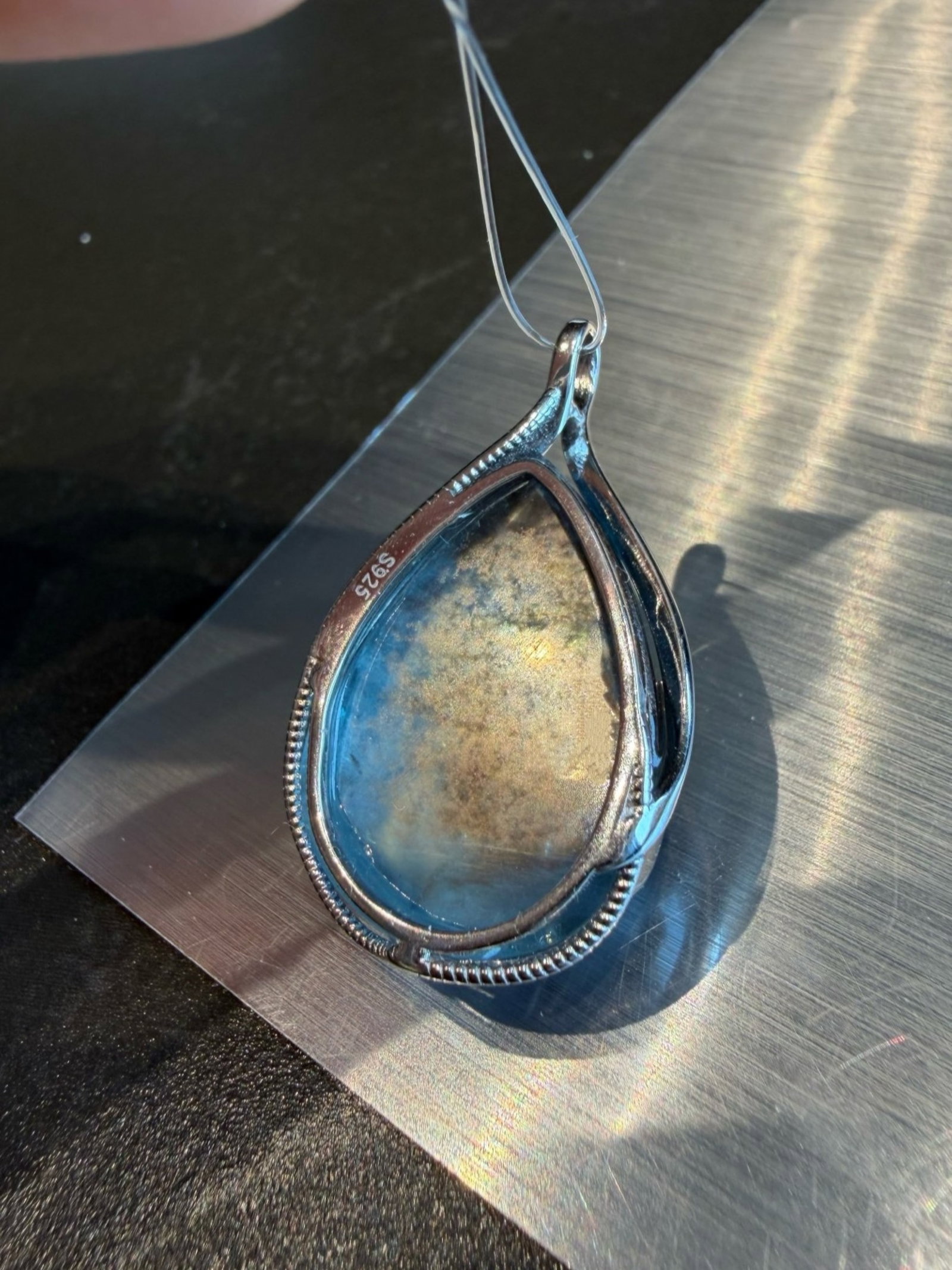 An Exquisite Aquamarine Necklace: An Exquisite Aquamarine Necklace,Size:1inx0.7inx0.4in,Weight:8.5g 海蓝宝项链