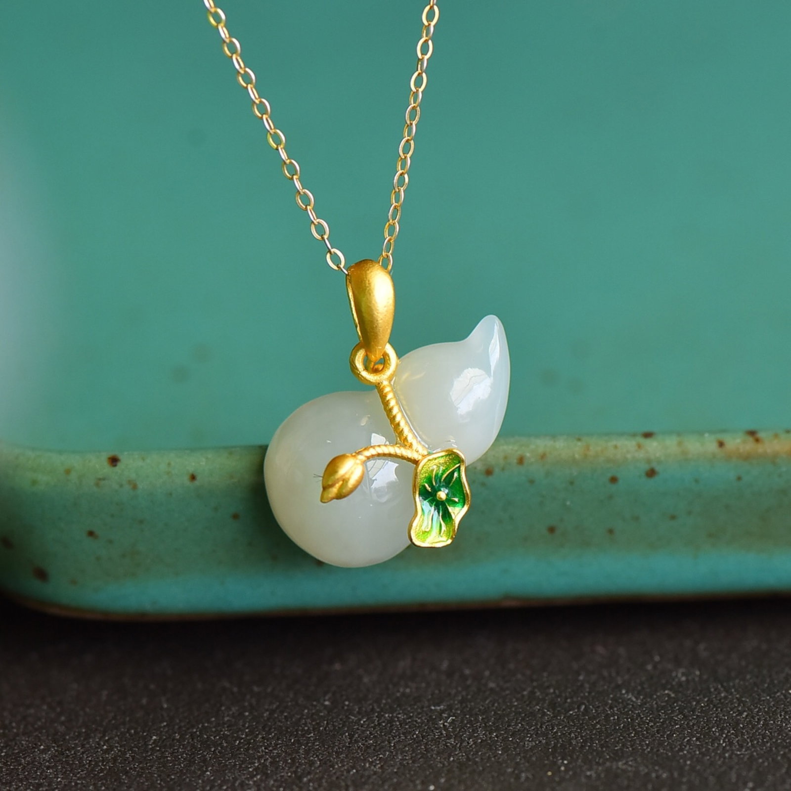An Exquisite Sterling Silver-Gold Plated Inlaid White Jade Pendant: An Exquisite Sterling Silver-Gold Plated Inlaid White Jade Pendant 纯银镀金镶白玉吊坠