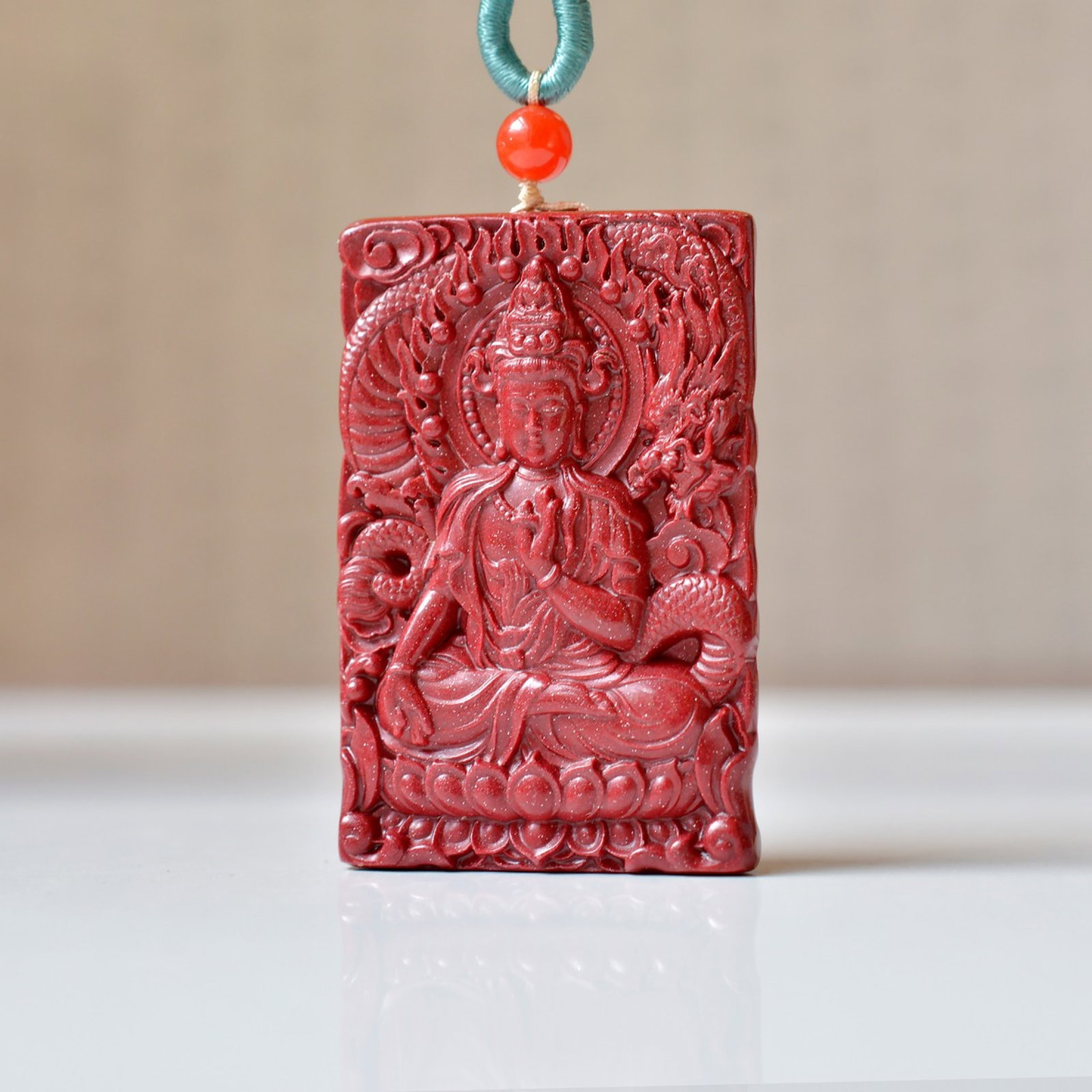 An Exquisite Cinnabar Pendant with Statue of Avalokitesvara: An Exquisite Cinnabar Pendant with Statue of Avalokitesvara,Size:1.1inx1.7in,Weight:22.20g 朱砂挂件带观音像