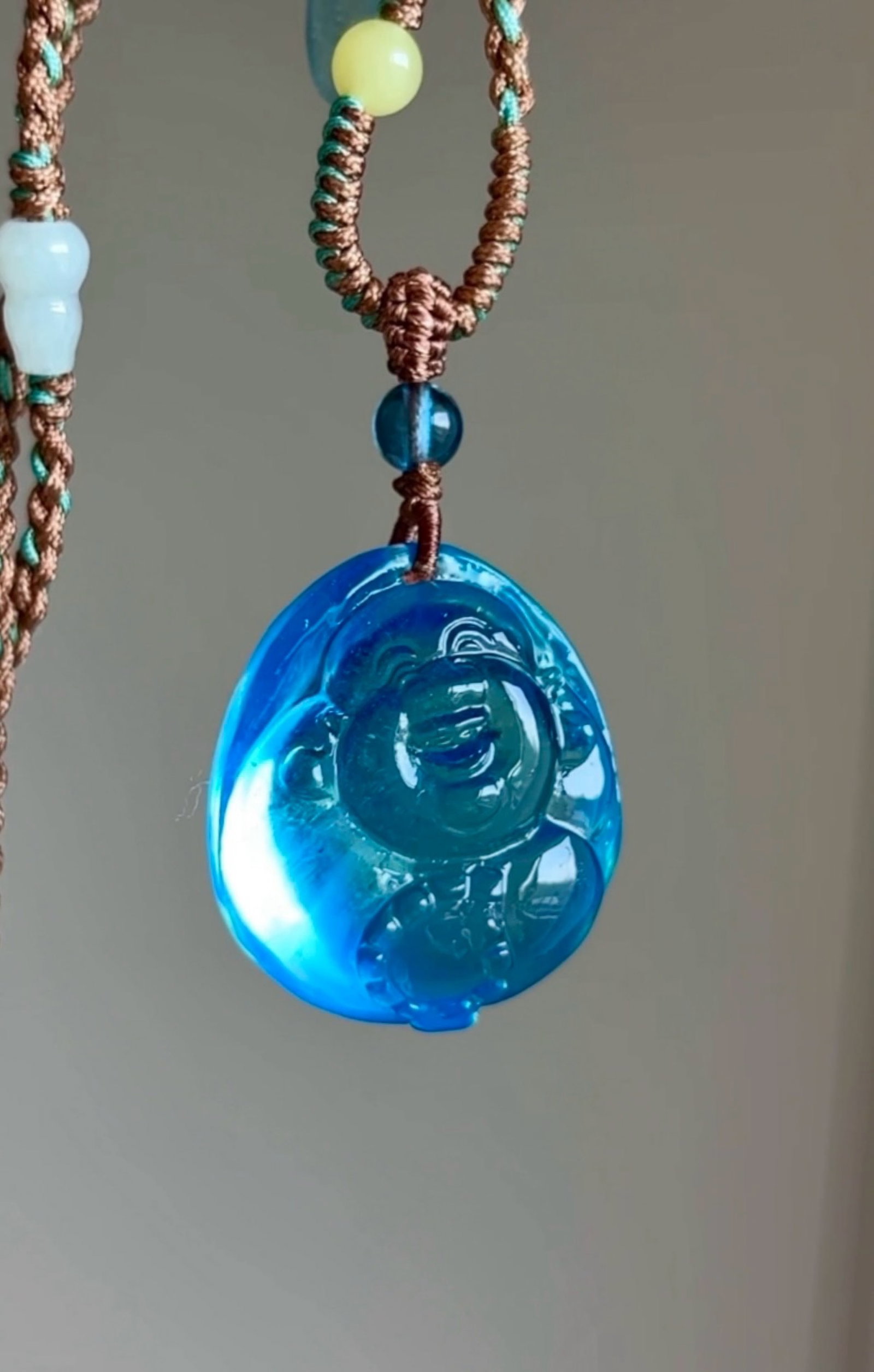 An Exquisite Aquamarine Statue of Maitreya Buddha Necklace: An Exquisite Aquamarine Statue of Maitreya Buddha Necklace,Size:1inx0.9inx0.6in,Weight:14.6g 海蓝宝弥勒佛像项链