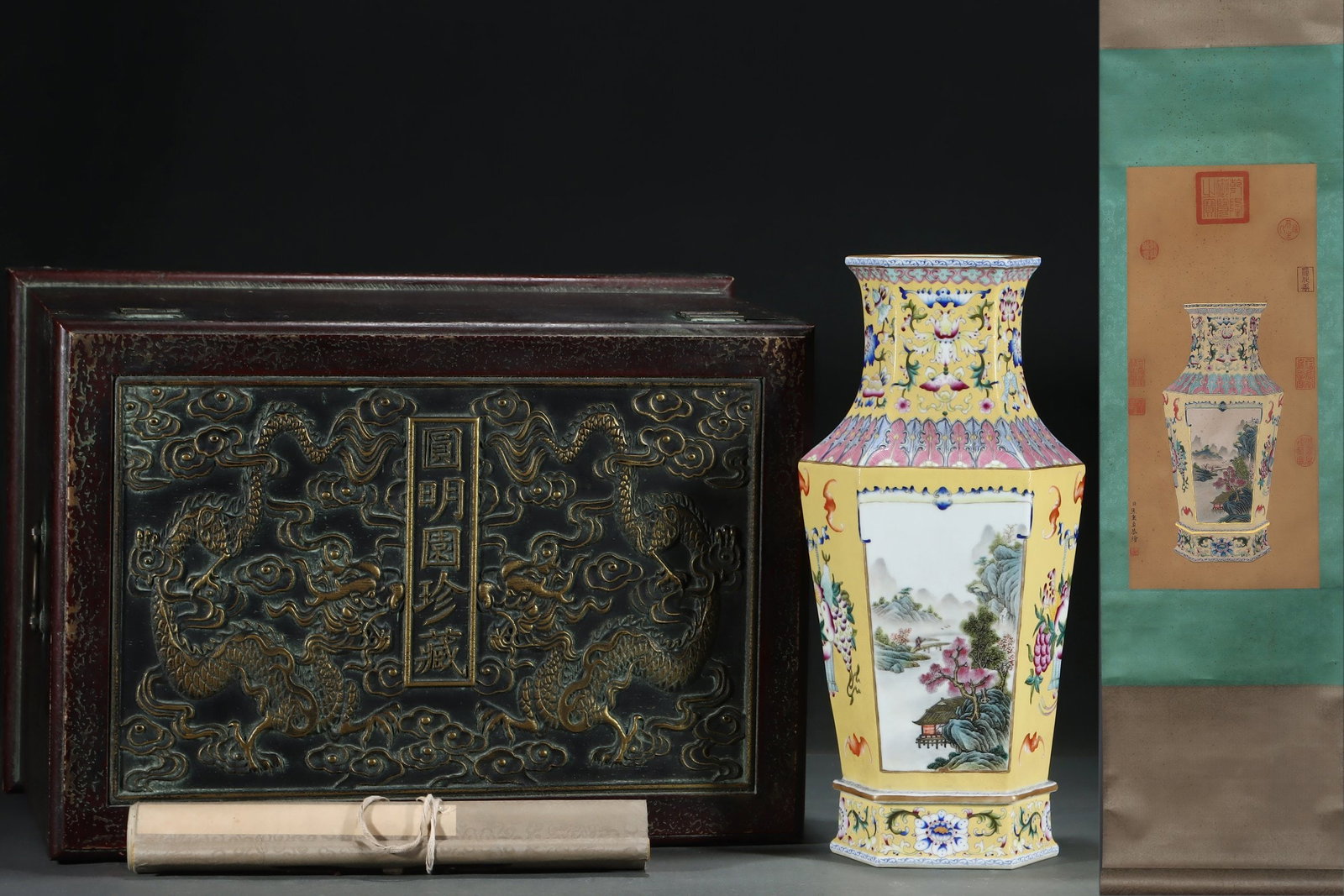 A Huge Yellow-ground famille rose hexagonal vase decorated with reserved landscape panels, gilt: A Huge Yellow-ground famille rose hexagonal vase decorated with reserved landscape panels, gilt decoration, with a silk painting hanging scroll,Qing Dynasty, China, Qianlong Four-character Mark,Size:1