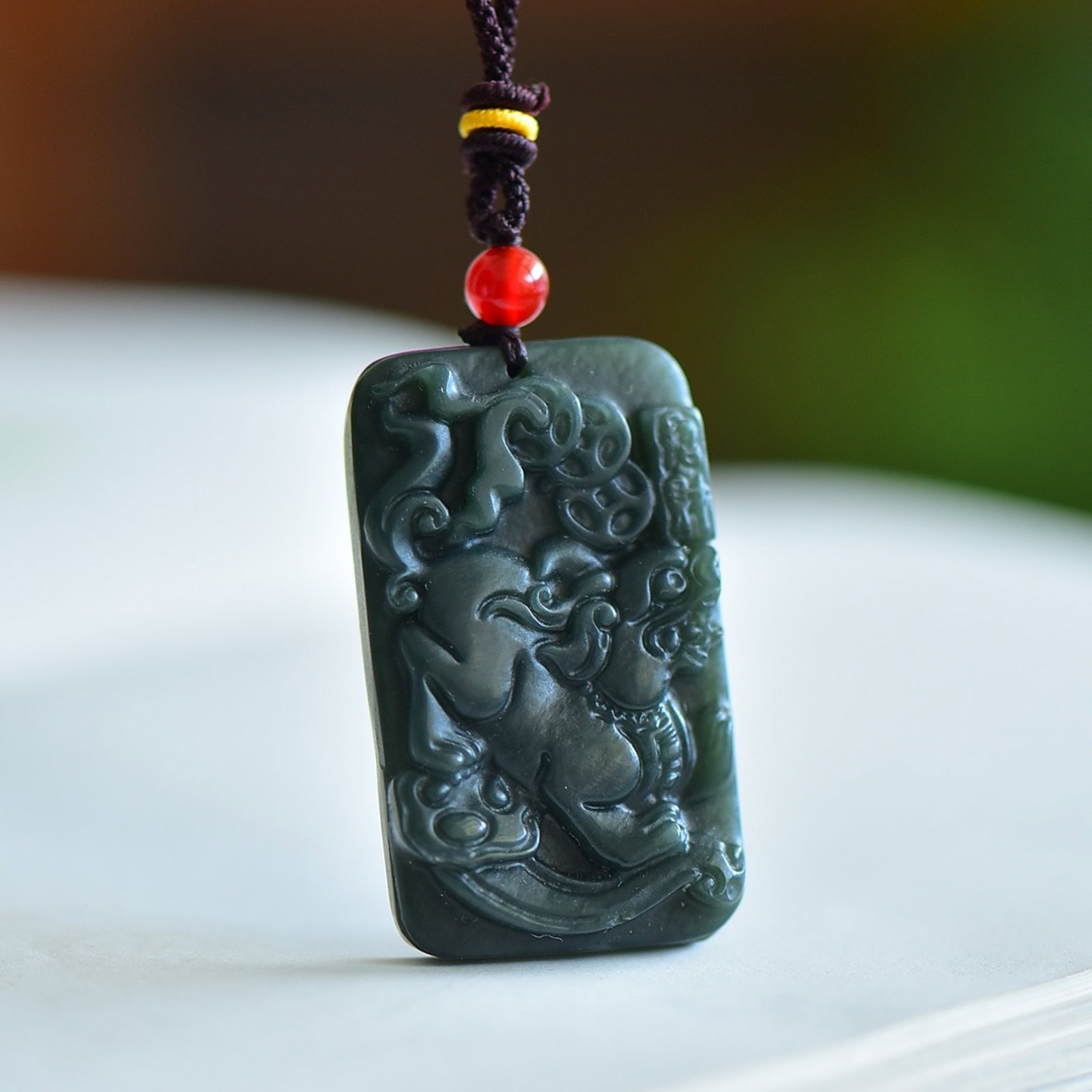An Exquisite Sapphire Auspicious Beast Pattern Pendant: An Exquisite Sapphire Auspicious Beast Pattern Pendant,Size:46mmx27mm 青玉瑞兽纹吊坠