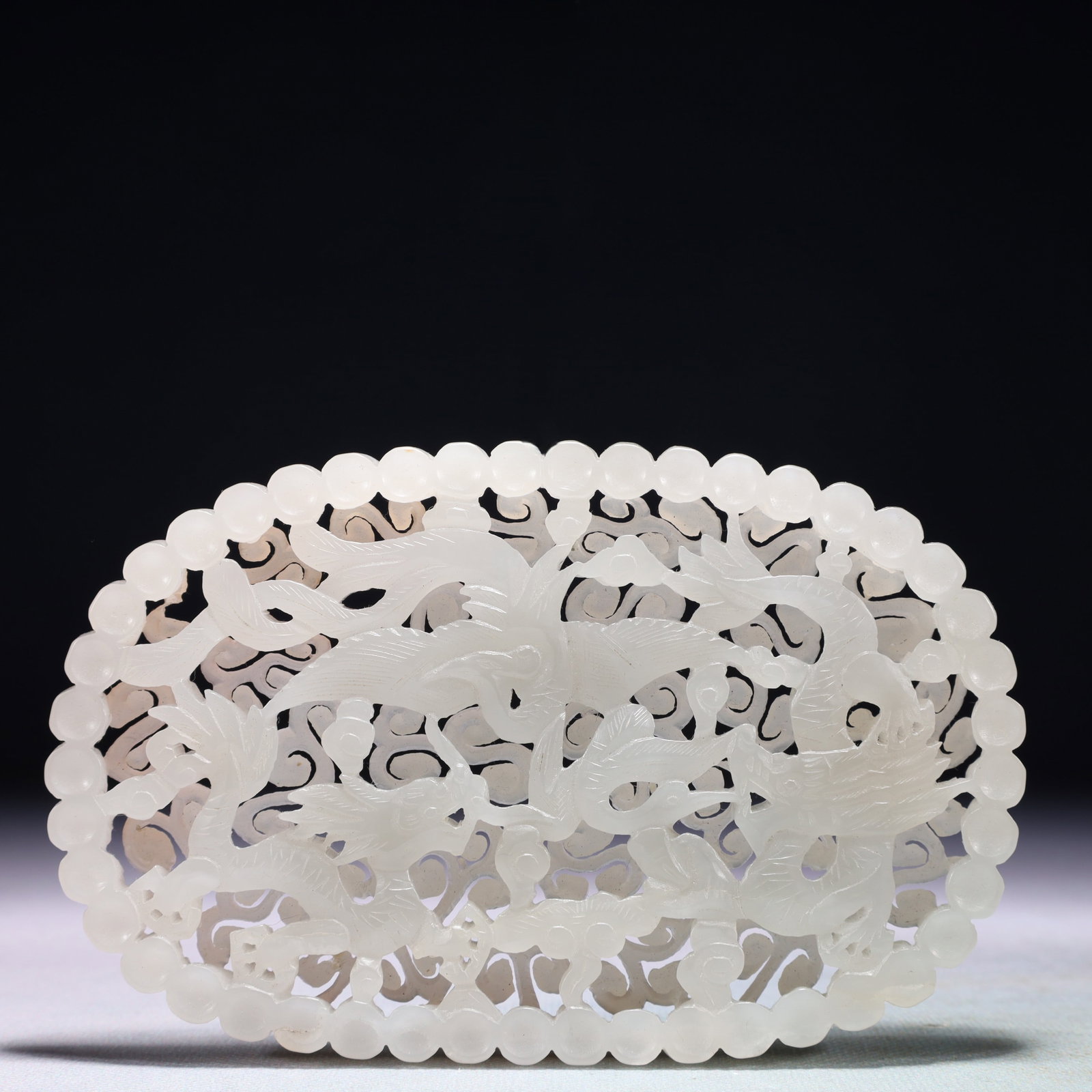 An Exquisite White Jade Dragon and Phoenix Pattern Pendant: An Exquisite White Jade Dragon and Phoenix Pattern Pendant,Qing Dynasty,China,Size:5.7inx3.5in,Weight:235.2g 白玉龙凤纹佩,中国清代