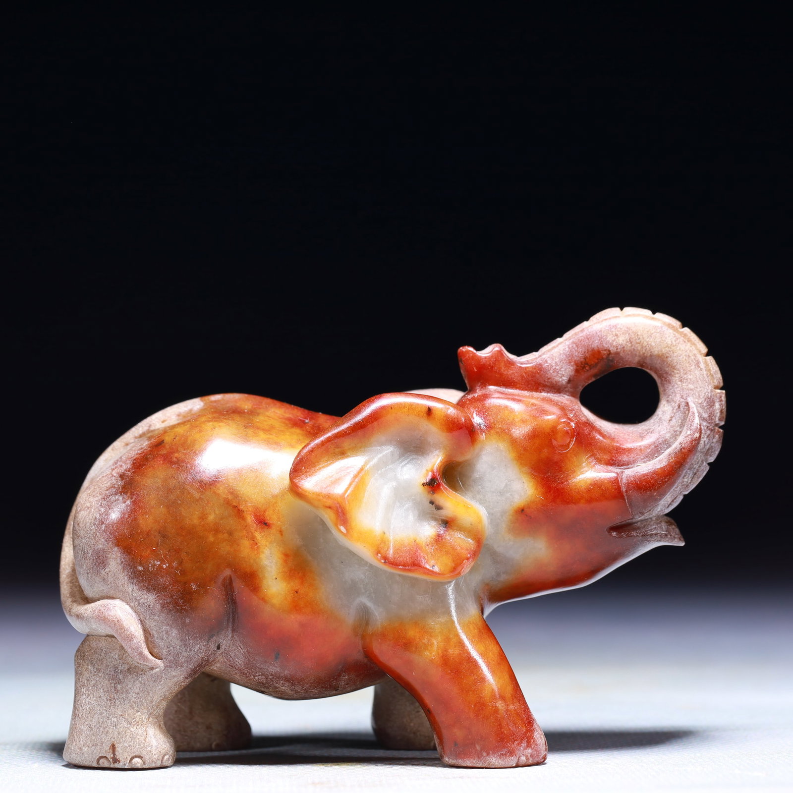 An Exquisite Archaic Jade Elephant Ornament: An Exquisite Archaic Jade Elephant Ornament,Ancient Time,China,Size:4.3inx1.6inx1.4in,Weight:346g 高古玉象摆件中国远古时期