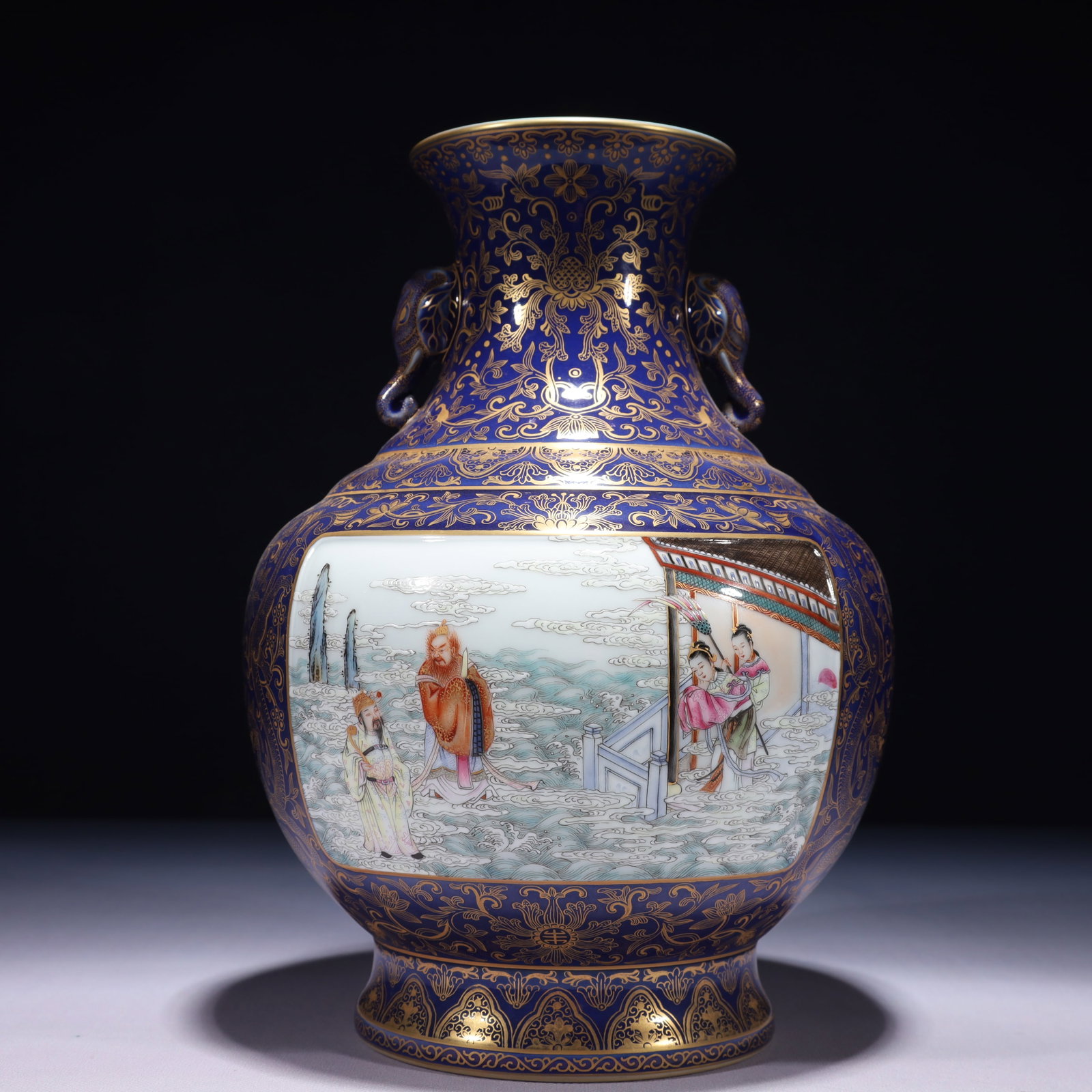 An Exquisite Ji Blue Glazed Famille-Rose Painted Gold Landscape and Figure Pattern Double-Ears Vase: An Exquisite Ji Blue Glazed Famille-Rose Painted Gold Landscape and Figure Pattern Double-Ears Vase,Qing Dynasty,China,Qianlong Six-character Mark,Size:7.1inx11in,Weight:2450g 霁蓝釉