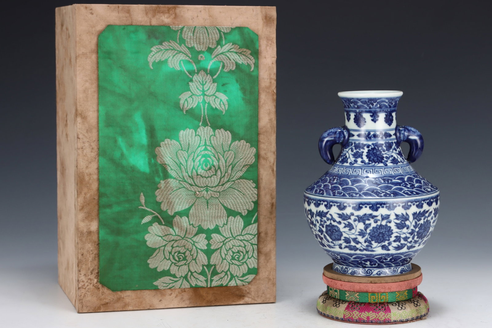 An Exquisite Blue and White Seawater Lotus Pattern Elephant-Ears Vase: An Exquisite Blue and White Seawater Lotus Pattern Elephant-Ears Vase,Qing Dynasty,China,Qianlong Six-character Mark,Size:7inx5.2in 青花海水缠枝莲纹#