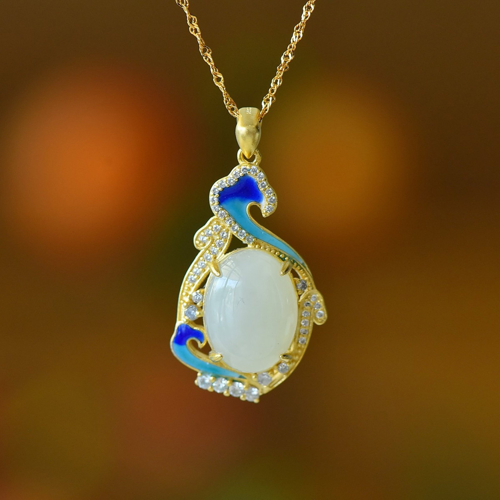 An Exquisite Sterling Silver-Gold Plated Inlaid White Jade Enamel Pendant: An Exquisite Sterling Silver-Gold Plated Inlaid White Jade Enamel Pendant,Size:0.5inx0.6in 纯银镀金镶白玉珐琅吊坠