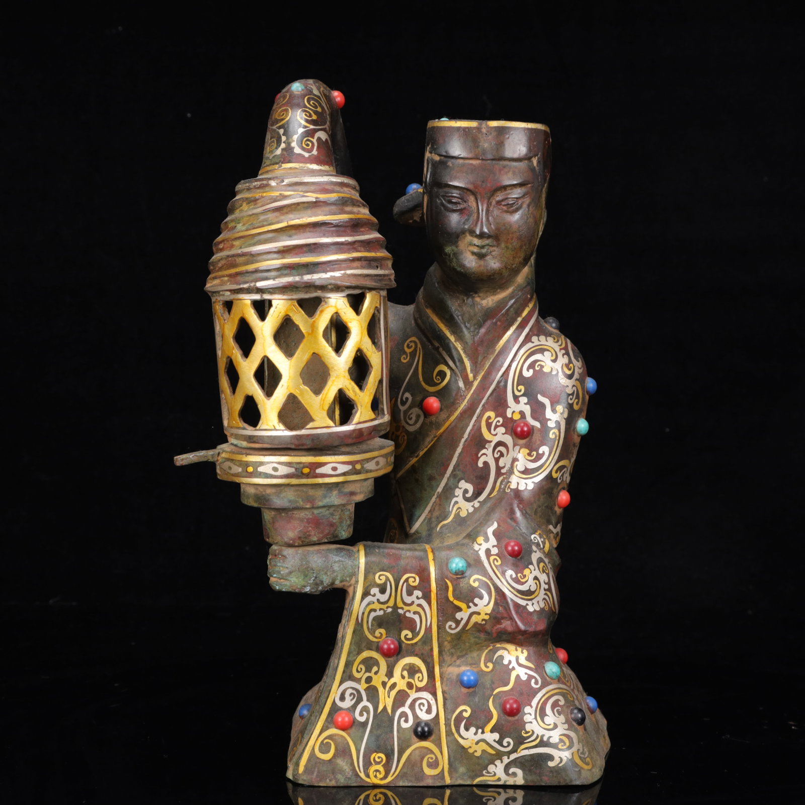 An Archaic Bronze Inlaid Gold and Silver Figure Palace Lantern,Inlaid Gems: An Archaic Bronze Inlaid Gold and Silver Figure Palace Lantern,Inlaid Gems,The Warring States period in China,Size:5.9inx4.7inx11.4in,Weight:2950g