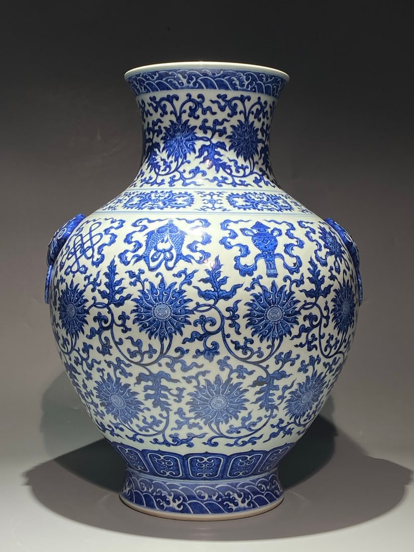 A Huge Blue and White Lotus and Eight Treasures Pattern Beast-Ears Vase: A Huge Blue and White Lotus and Eight Treasures Pattern Beast-Ears Vase,Qing Dynasty,China,Qianlong Six-character Mark,Size:21.7inx15.7in 青花缠枝莲八宝ಬ