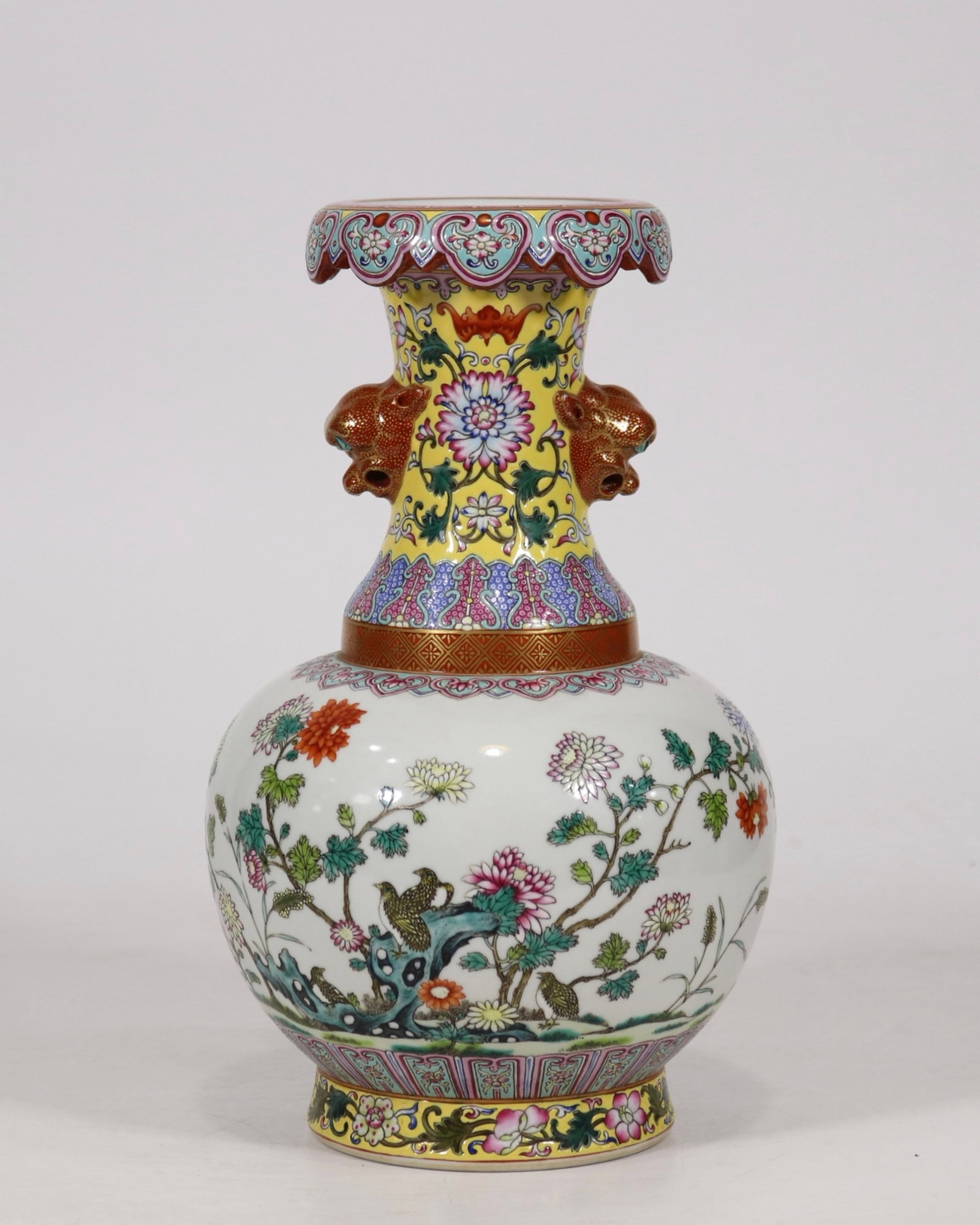 An Exquisite Famille-Rose Flower and Bird Pattern Beast-Ears Vase: An Exquisite Famille-Rose Flower and Bird Pattern Beast-Ears Vase,Qing Dynasty,China,Qianlong Six-character Mark,Size:10.2inx5.9in 粉彩花鸟纹兽耳瓶,