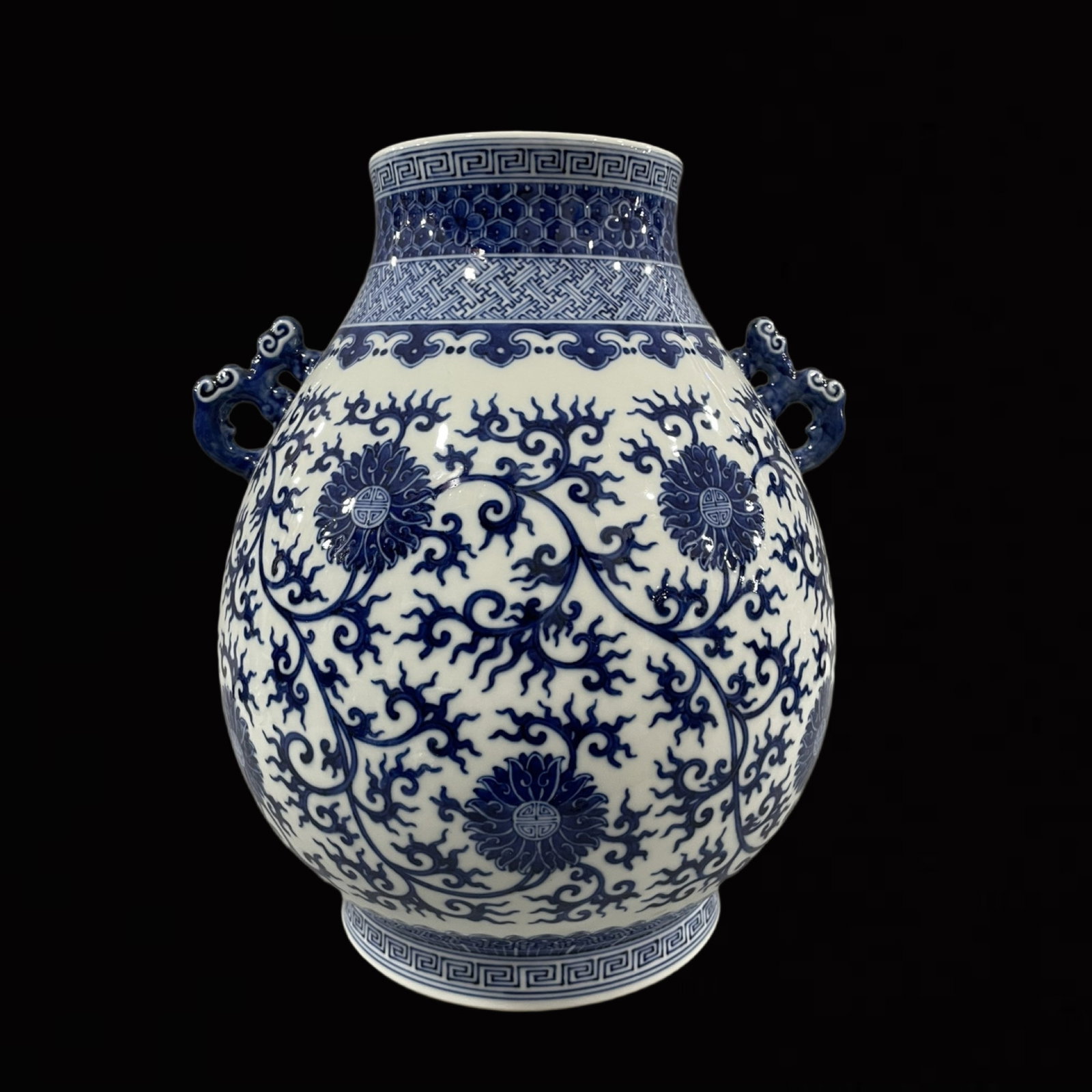 A Rare Blue and White Lotus Pattern Double-Ears Vase: A Rare Blue and White Lotus Pattern Double-Ears Vase,Qing Dynasty,China,Qianlong Six-character Mark,Size:13.6inx11.8in