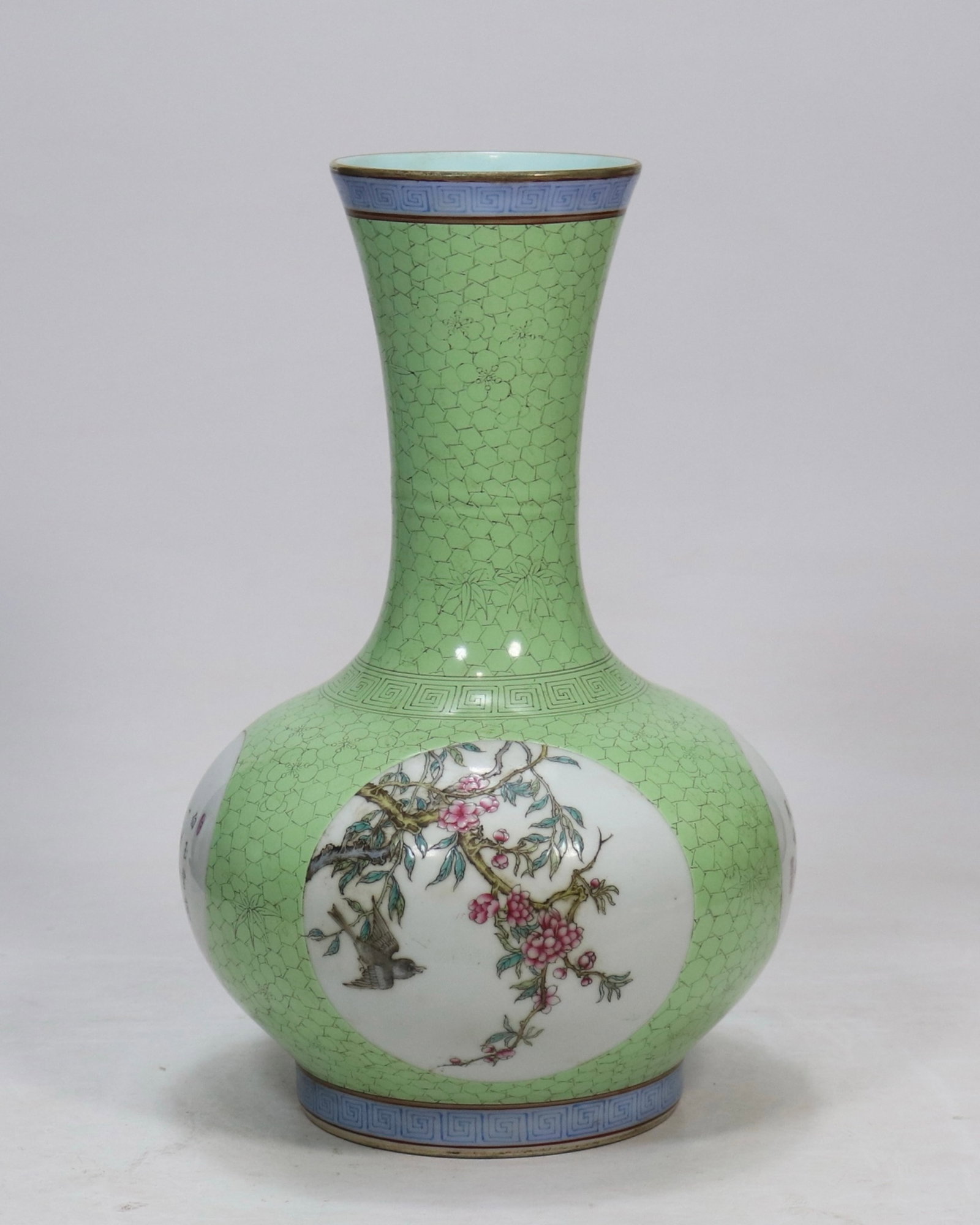 A Rare Green Glazed Famille-Rose Flower and Bird Pattern Vase,with poem: A Rare Green Glazed Famille-Rose Flower and Bird Pattern Vase,with poem,Qing Dynasty,China,Qianlong Six-character Mark,Size:12.8inx4in 绿釉粉彩花鸟纹瓶,