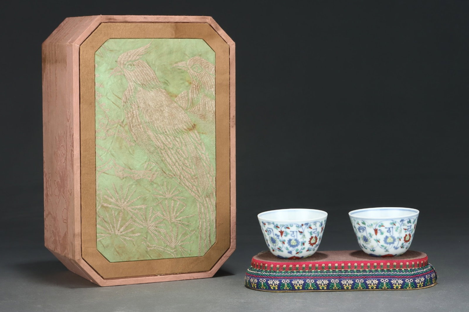 A Pair of Exquisite Doucai Lotus Pattern Cups,With Sanskrit: A Pair of Exquisite Doucai Lotus Pattern Cups,With Sanskrit,Ming Dynasty,China,Chenghua Six-character Mark,Size:2inx2.9in
