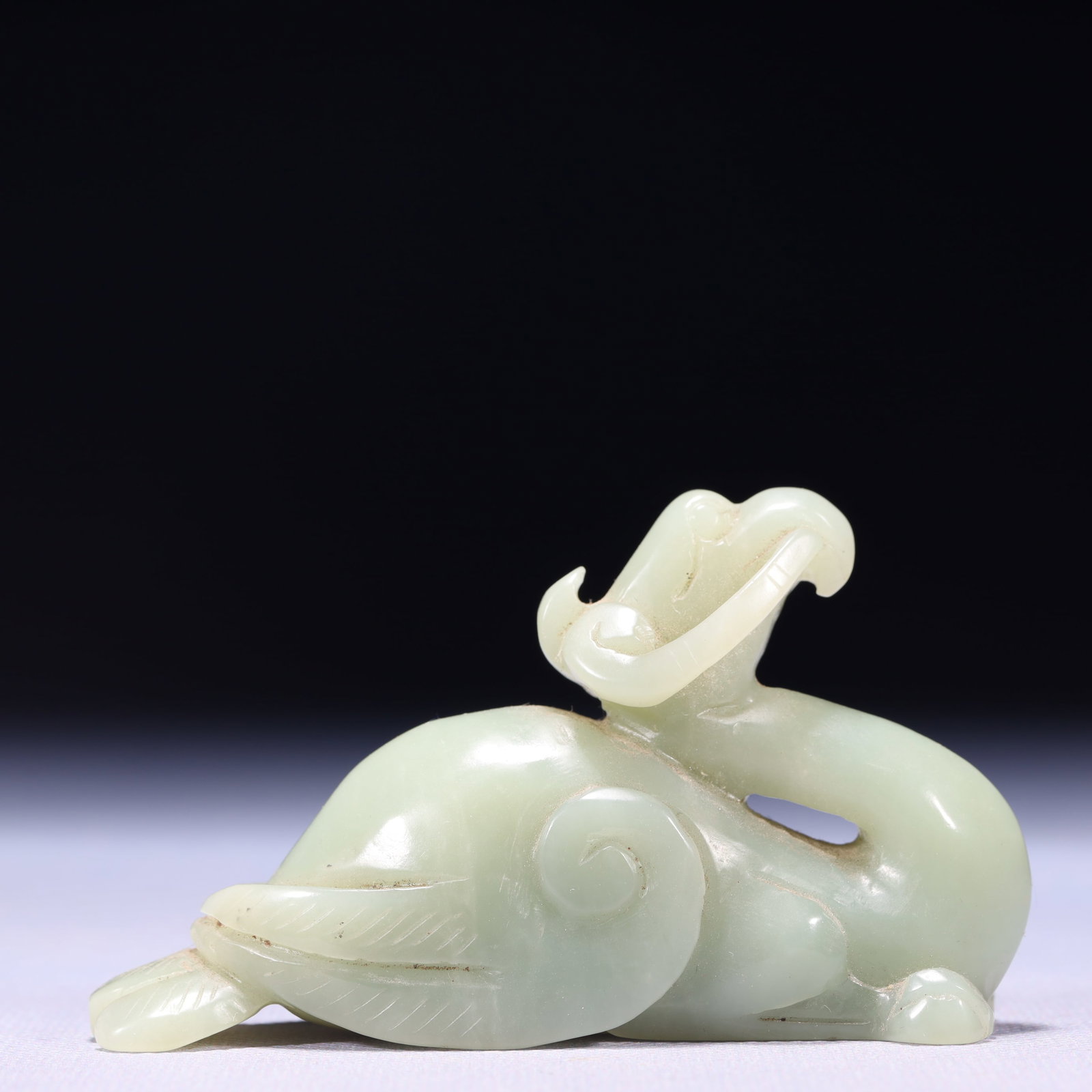 An Exquisite Green Jade Phoenix Ornament: An Exquisite Green Jade Phoenix Ornament,Qing Dynasty,China,Size:3.5inx1.2inx2.2in,Weight:160g 青玉凤摆件,中国清代