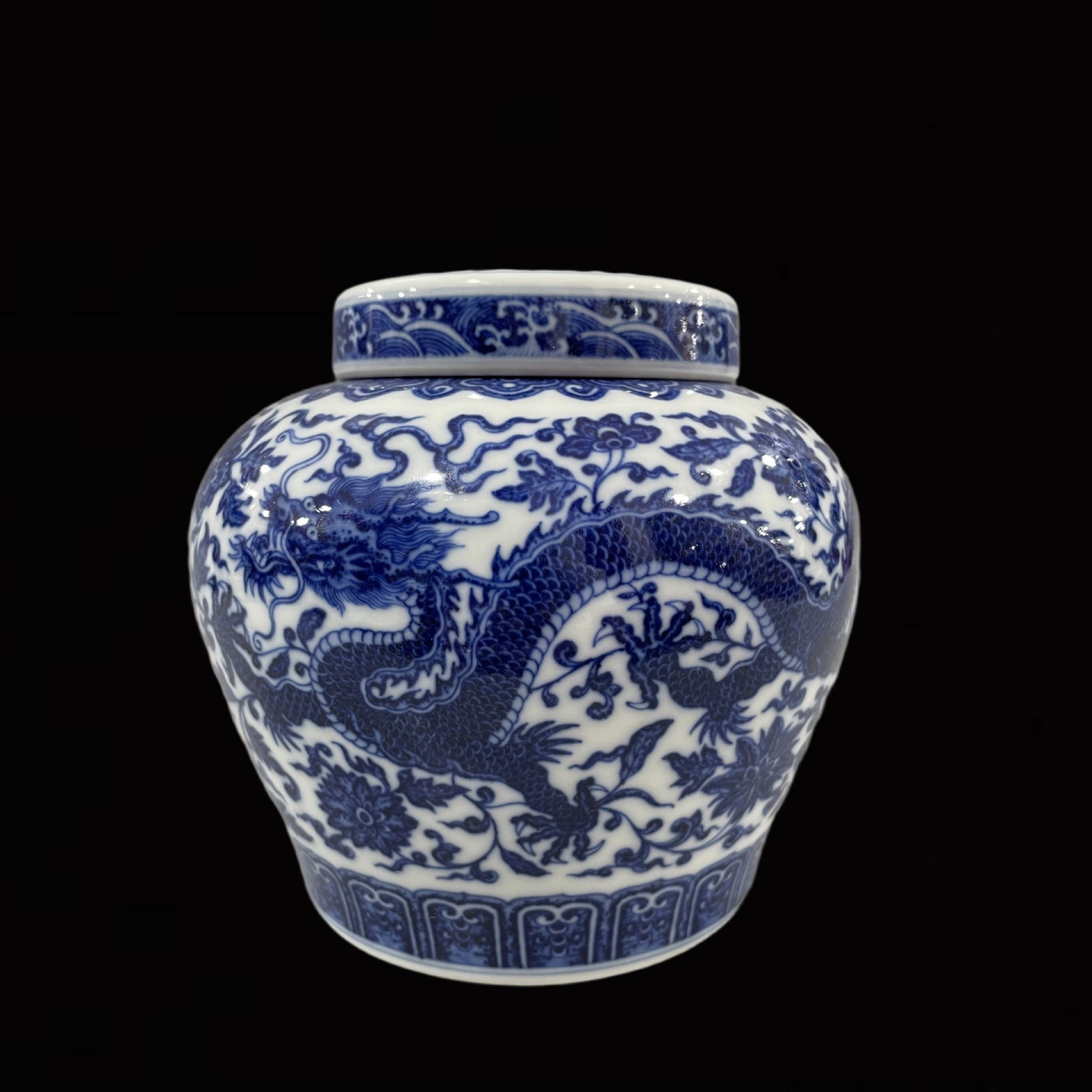 An Exquisite Blue and White Lotus and Dragon Pattern Jar with Cover: An Exquisite Blue and White Lotus and Dragon Pattern Jar with Cover,Qing Dynasty,China,Qianlong Six-character Mark,Size:5.3inx5.5in 青花缠枝莲龙纹盖 