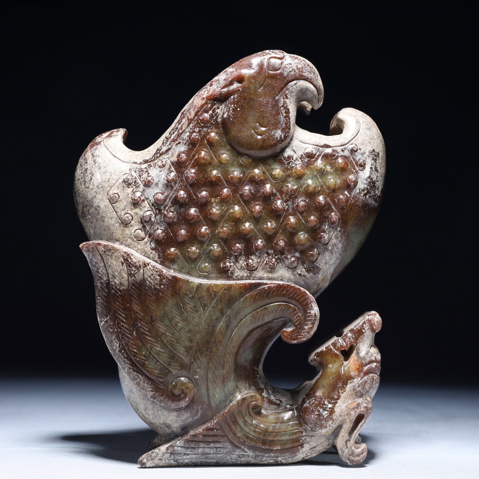 An Archaic Archaic Jade Phoenix Ornament: An Archaic Archaic Jade Phoenix Ornament,Ancient Time,China,Size:5.1inx2.4inx6.7in,Weight:1350g 高古玉凤摆件,中国远古时期