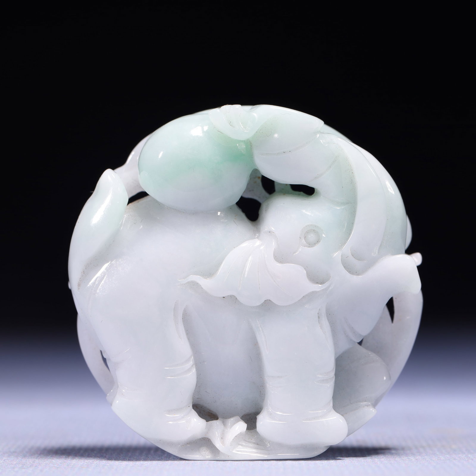 An Exquisite Jadeite Elephant Pattern Pendant: An Exquisite Jadeite Elephant Pattern Pendant,Qing Dynasty,China,Size:2.2inx0.6inx2.2in,Weight:105g 翡翠象纹挂件,中国清代