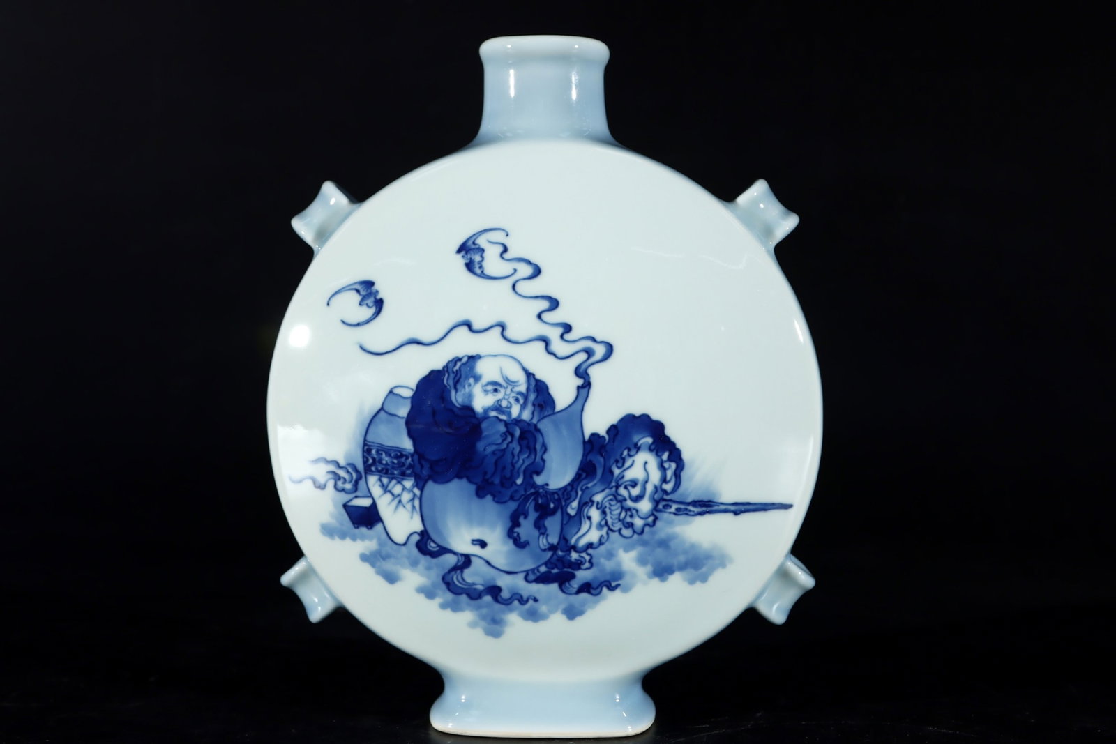 An Exquisite Blue and White Statue of Arhat Pattern Four Ears Vase: An Exquisite Blue and White Statue of Arhat Pattern Four Ears Vase,Qing Dynasty,China,Yongzheng Six-character Mark,Size:7.9inx6.3in 青花罗汉像纹四耳