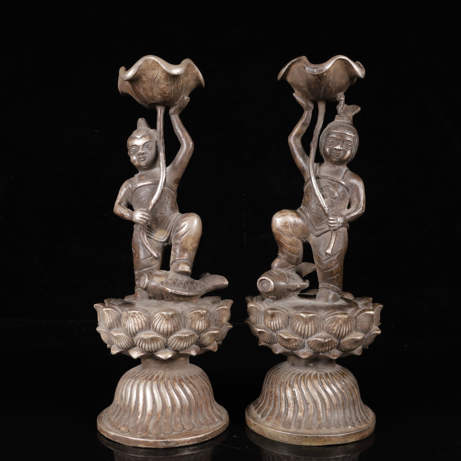 A Pair of Exquisite Silver-Plated Bronze Figure Candlesticks: A Pair of Exquisite Silver-Plated Bronze Figure Candlesticks,Qing Dynasty,China,Qianlong Four-Character Mark,Size:3.9inx11.4in,Weight:4050g 一对铜镀银人物