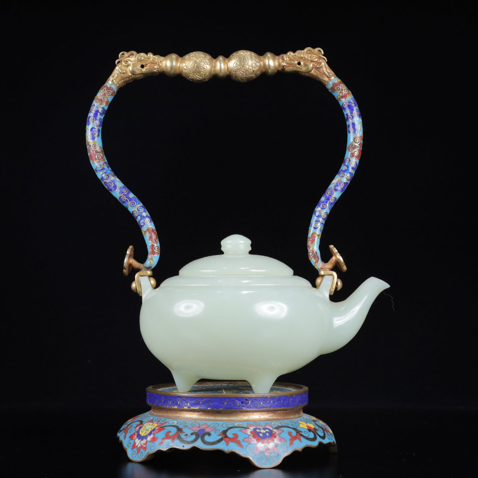 An Exquisite Cloisonne Inlaid White Jade Flower Pattern Tripod Ewer,with Base: An Exquisite Cloisonne Inlaid White Jade Flower Pattern Tripod Ewer,with Base,Qing Dynasty, China,Size:5.9inx8.3inx9.1in,Weight:950g 景泰蓝嵌白玉花卉