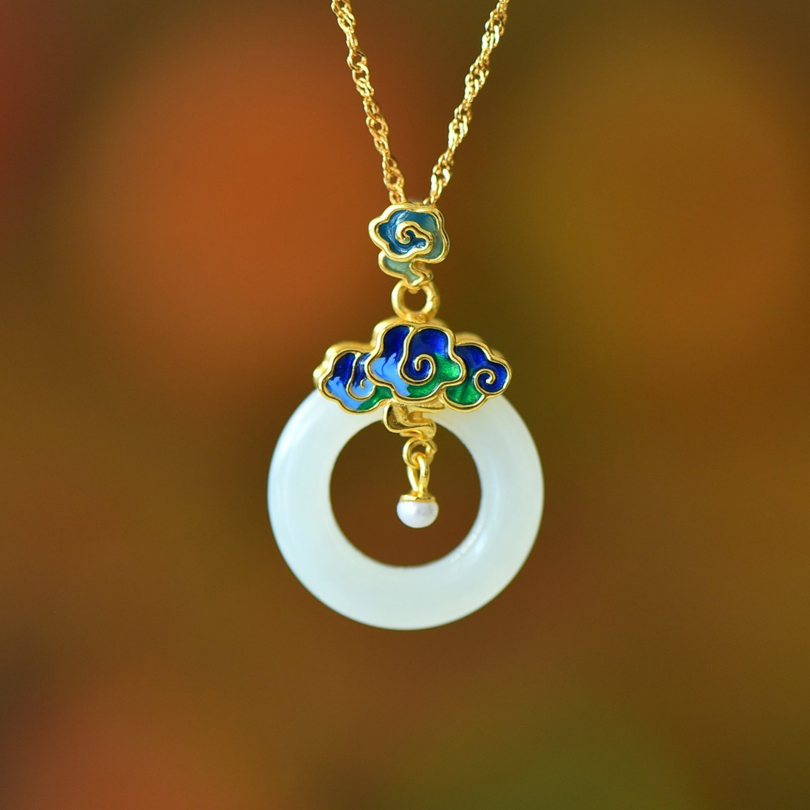 An Exquisite Sterling Silver-Gold Plated Inlaid White Jade Pendant: An Exquisite Sterling Silver-Gold Plated Inlaid White Jade Pendant 纯银镀金镶白玉吊坠