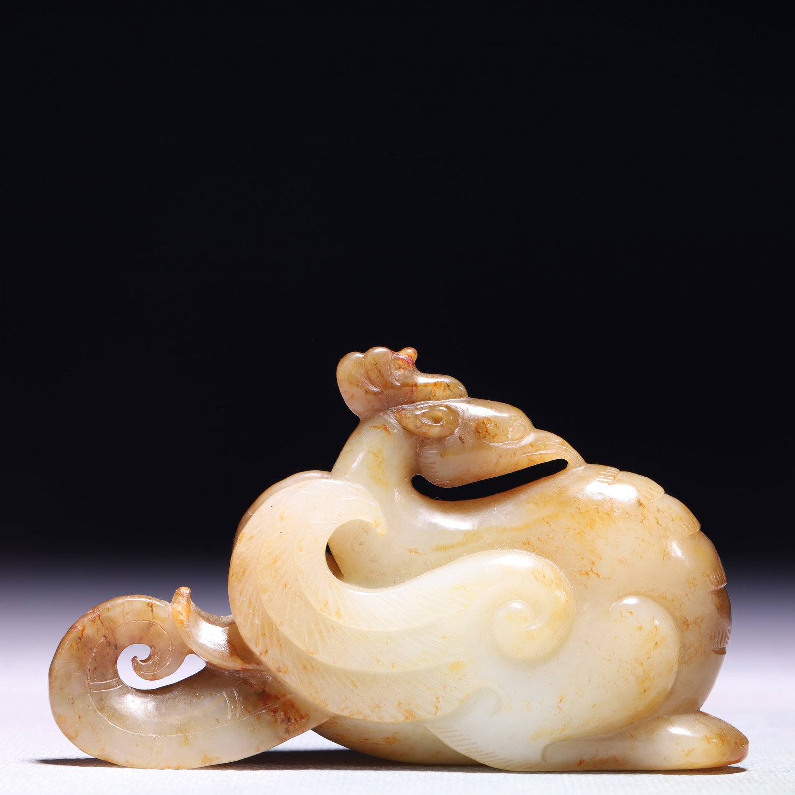 An Exquisite White Jade Phoenix Ornament: An Exquisite White Jade Phoenix Ornament,Qing Dynasty,China,Size:3.9inx1.2inx2.2in,Weight:189g 白玉凤摆件,中国清代