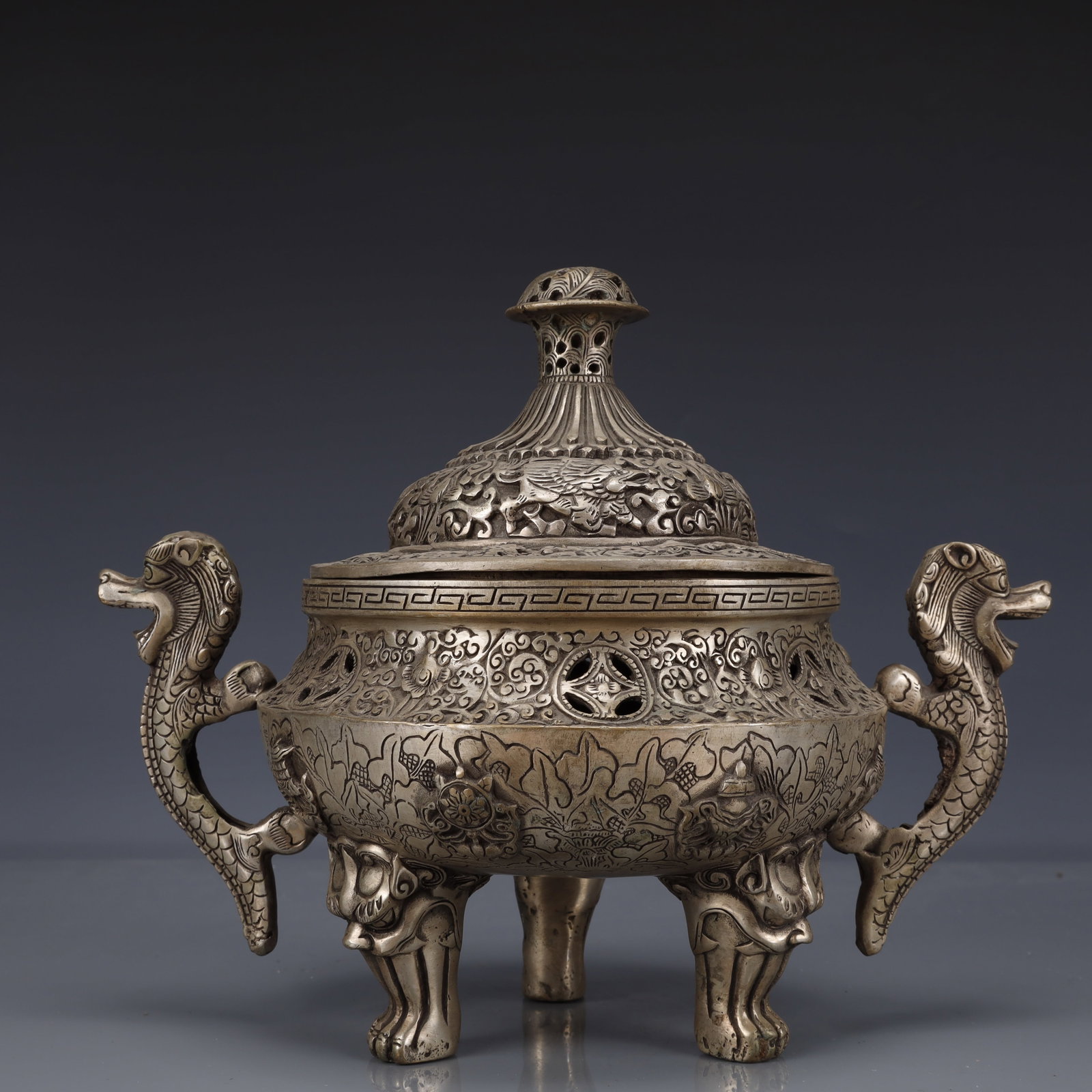 An Exquisite Silver-Plated Bronze Auspicious Beast Pattern Double-Ears and Tripod Censer: An Exquisite Silver-Plated Bronze Auspicious Beast Pattern Double-Ears and Tripod Censer,The Republic of China,Size:11inx6.7inx8.7in,Weight:2250g 铜镀银瑞兽纹ࡡ