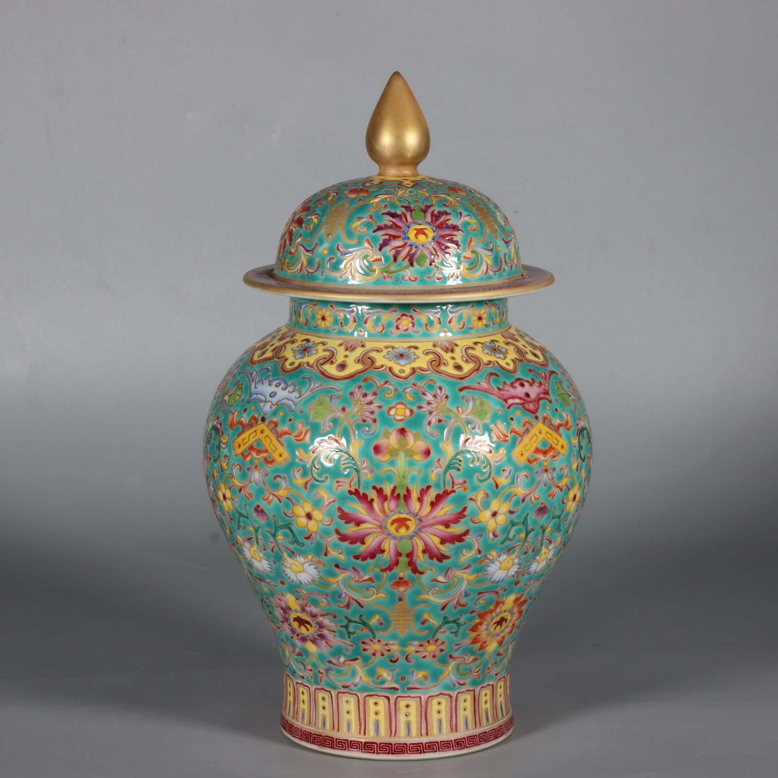 An Exquisite Green Ground Enamel Lotus Pattern Jar with Cover: An Exquisite Green Ground Enamel Lotus Pattern Jar with Cover,Qing Dynasty,China,Qianlong Six-character Mark,Size:9.4inx3.3in 绿地珐琅彩缠枝莲纹&#
