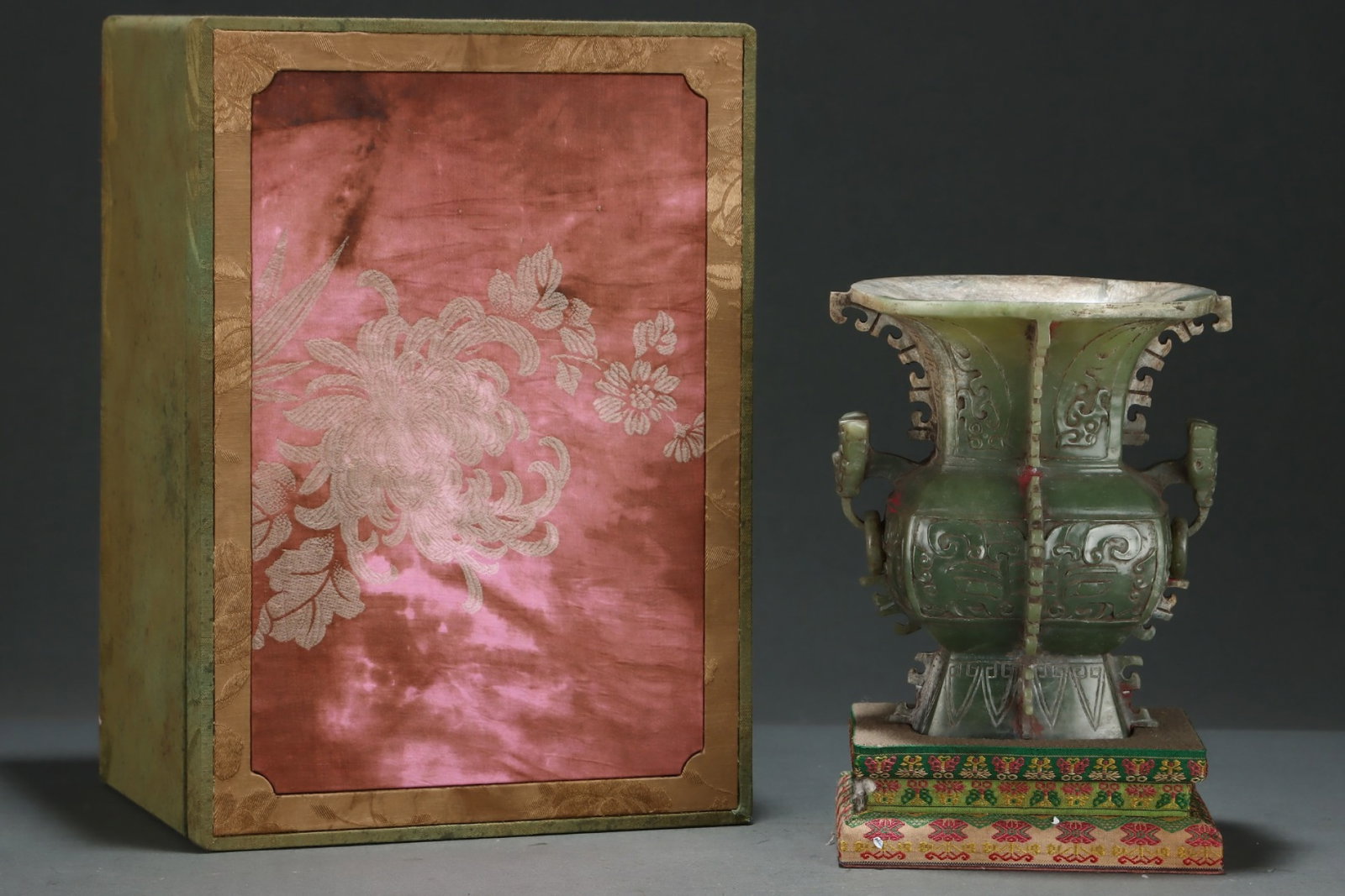 An Exquisite Green Jade Beast-Face Pattern Double-Ears Vase: An Exquisite Green Jade Beast-Face Pattern Double-Ears Vase,Qing Dynasty,China,Size:6.3inx6.3inx7.4in 青玉兽面纹双耳瓶,中国清代