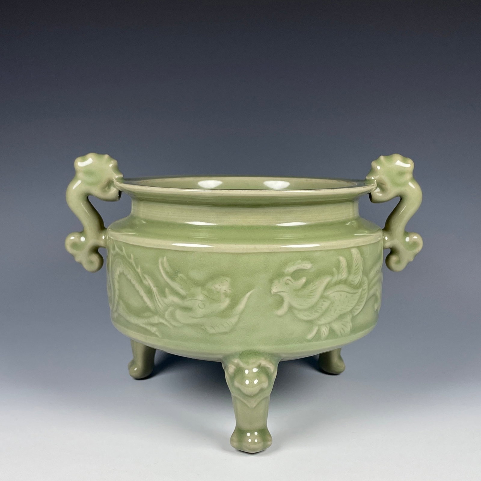 An Exquisite Yue yao Dragon and Phoenix Pattern Double-Ears and Tripod Censer: An Exquisite Yue yao Dragon and Phoenix Pattern Double-Ears and Tripod Censer,Song Dynasty,China,Size:5.5inx7.5in