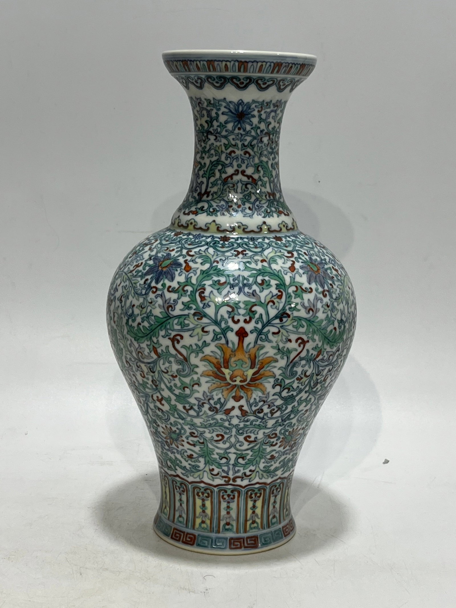 An Exquisite Doucai Lotus Pattern Vase: An Exquisite Doucai Lotus Pattern Vase,Qing Dynasty,China,Qianlong Six-character Mark,Size:11.6in 斗彩缠枝莲纹瓶,中国清代,乾&