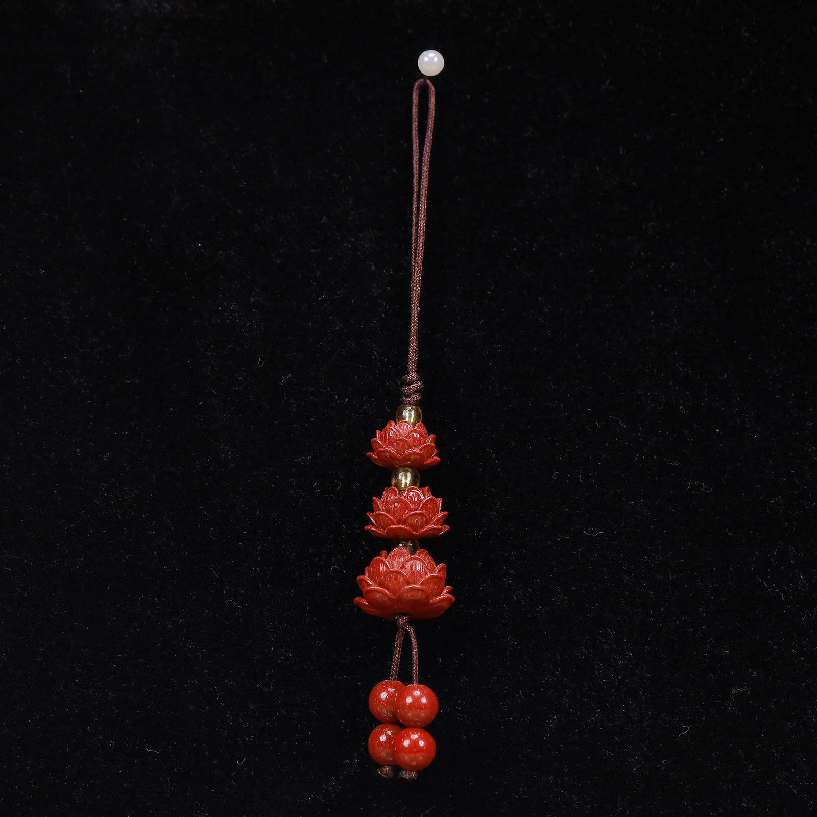 An Exquisite Cinnabar Lotus Pattern Pendant: An Exquisite Cinnabar Lotus Pattern Pendant, Size:0.6inx1.2in, Weight:77g 朱砂莲花挂件