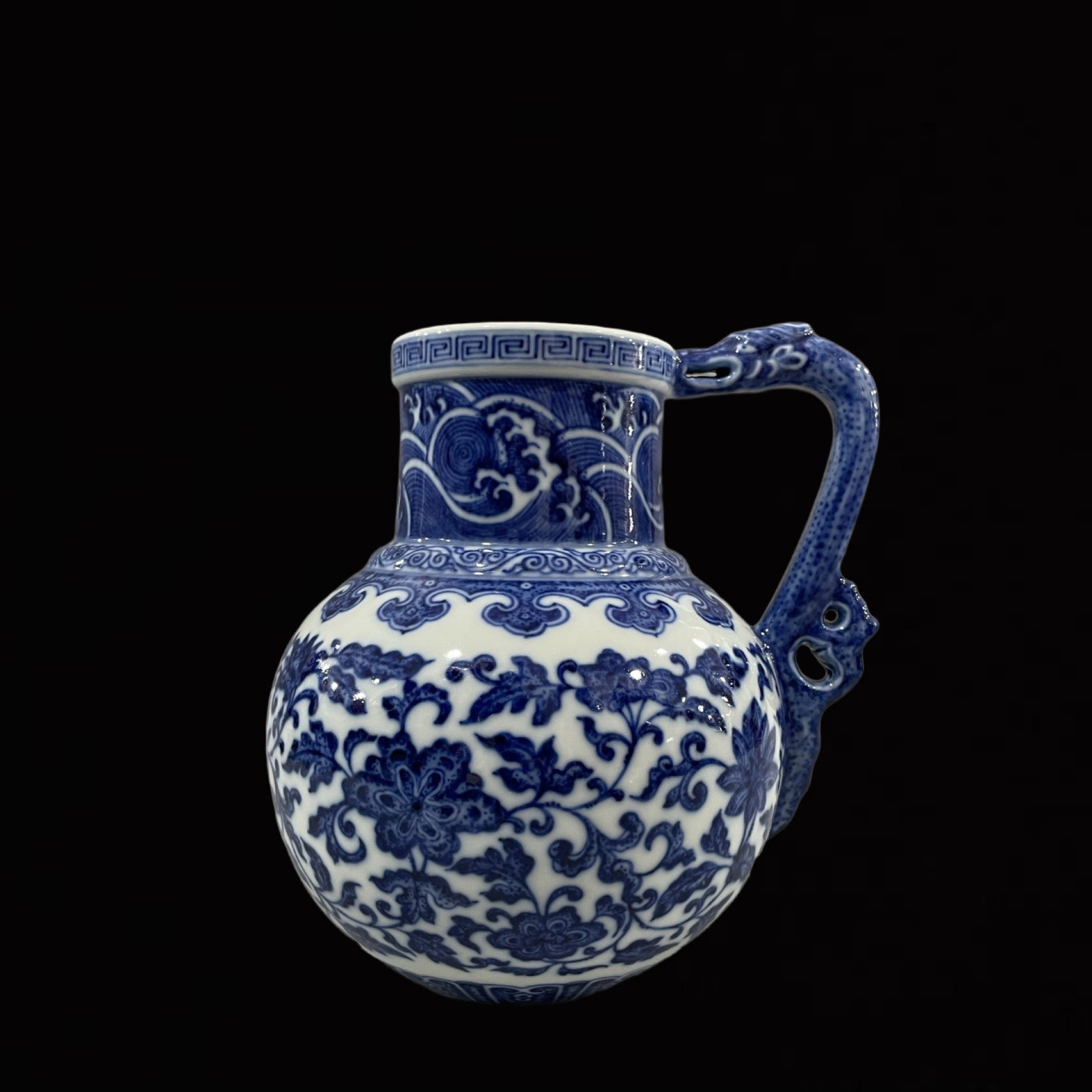 An Exquisite Blue and White Lotus Pattern Watering Can: An Exquisite Blue and White Lotus Pattern Watering Can,Qing Dynasty,China,Yongzheng Six-character Mark,Size:6.9inx6.3in 青花缠枝莲纹花浇,中国