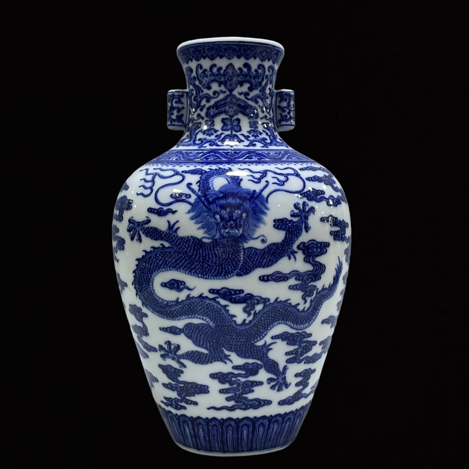 A Rare Blue and White Auspicious Cloud and Dragon Pattern Double-Ears Vase: A Rare Blue and White Auspicious Cloud and Dragon Pattern Double-Ears Vase,Qing Dynasty,China,Qianlong Six-character Mark,Size:14inx8.3in 青花祥云龙纹双೑