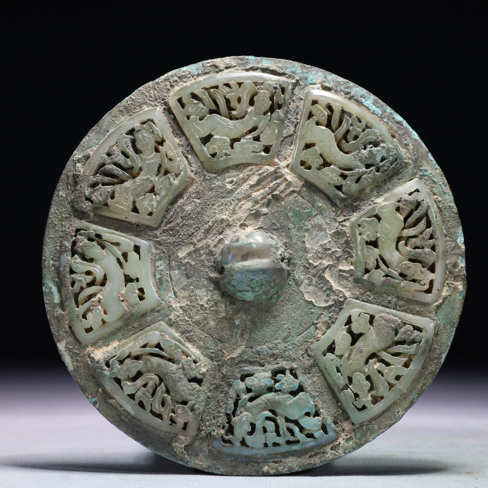 An Archaic Bronze Inlaid White Jade Beast Pattern Ornament: An Archaic Bronze Inlaid White Jade Beast Pattern Ornament,the Warring States period in China,Size:5.3inx5.3in,Weight:411.9g 青铜嵌白玉兽纹摆件,&#