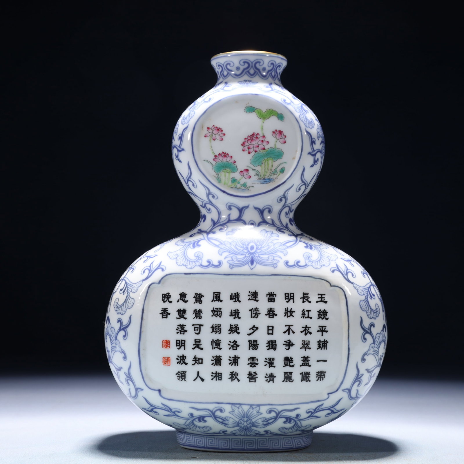 An Exquisite Blue and White Lotus Pattern Gourd-Shaped Vase,with poem: An Exquisite Blue and White Lotus Pattern Gourd-Shaped Vase,with poem,Qing Dynasty,China,Qianlong Six-character Mark,Size:5.9inx3.1inx9.1in,Weight:900g