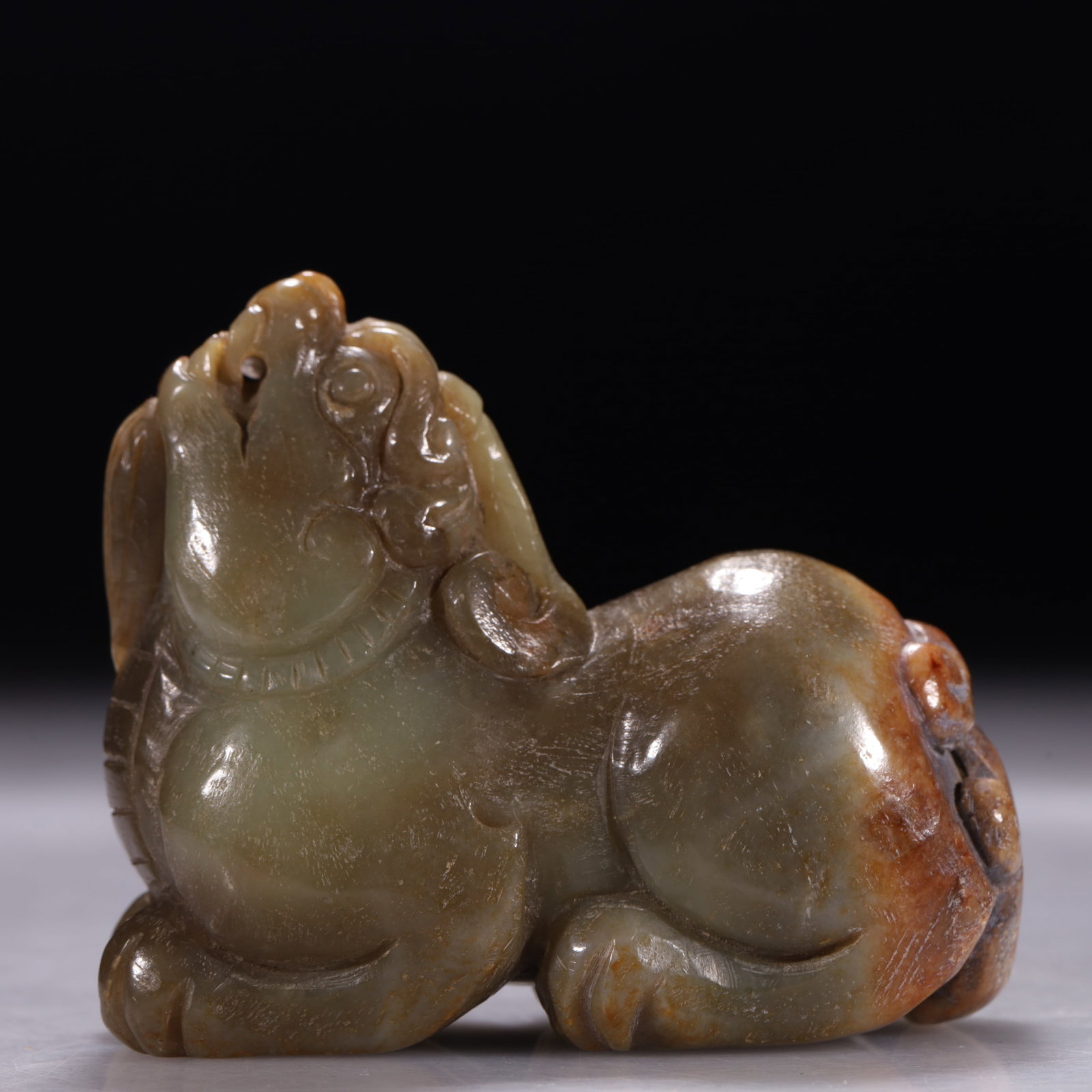 Hongshan Culture Celadon Jade Beast Pendant with Extensive Brown Inclusions (1 of 8)
