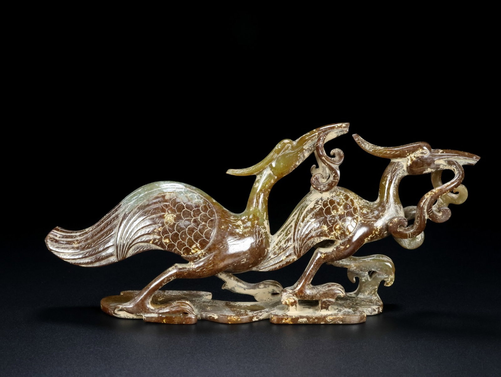 An Exquisite Archaic Jade Phoenix Ornament (1 of 9)
