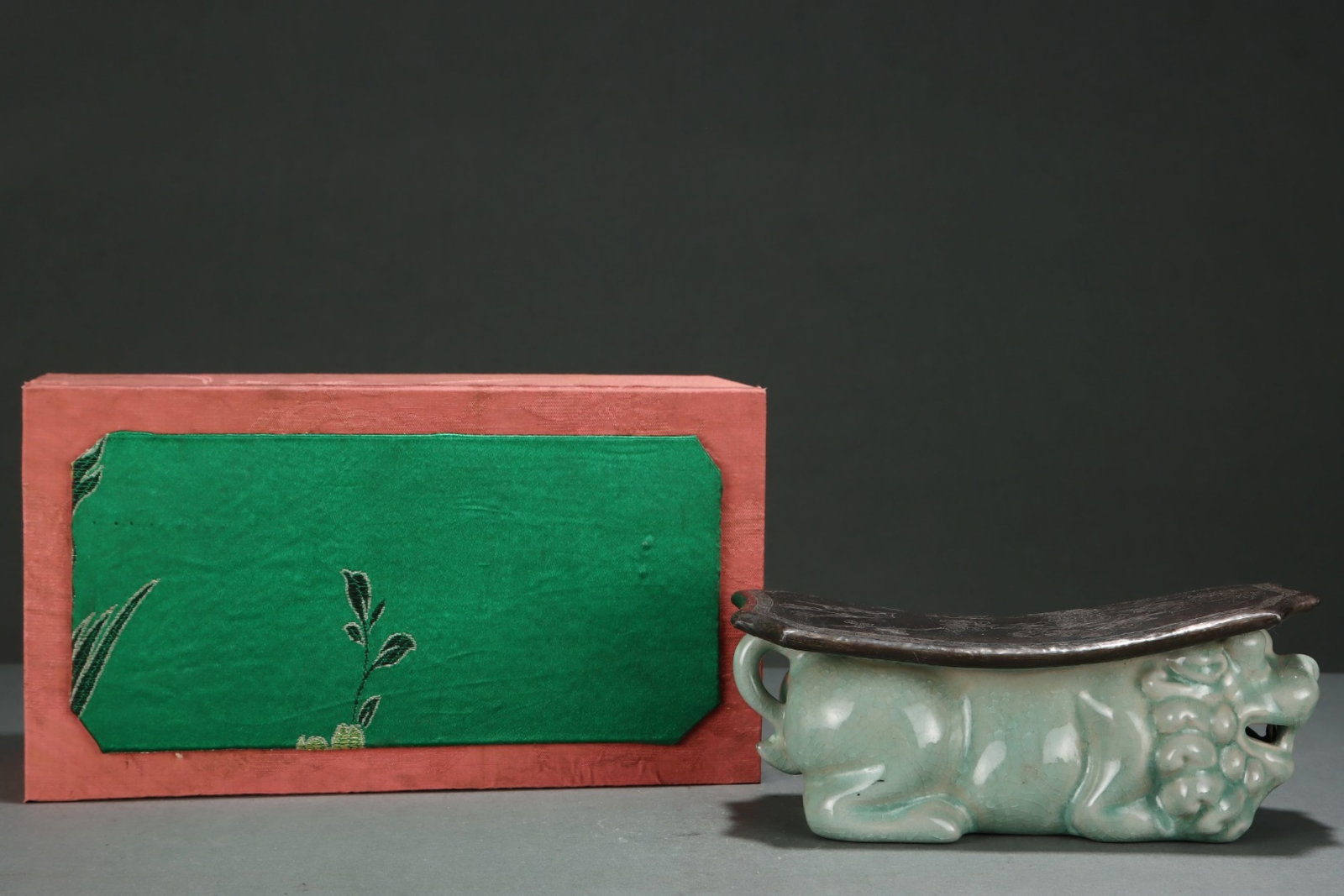 An Exquisite Ru yao Celadon Glazed Inlaid Silver Flower and Bird Pattern Pillow: An Exquisite Ru yao Celadon Glazed Inlaid Silver Flower and Bird Pattern Pillow,Song Dynasty,China,Size:3.9inx9.2in 汝窑青釉嵌银花鸟纹枕