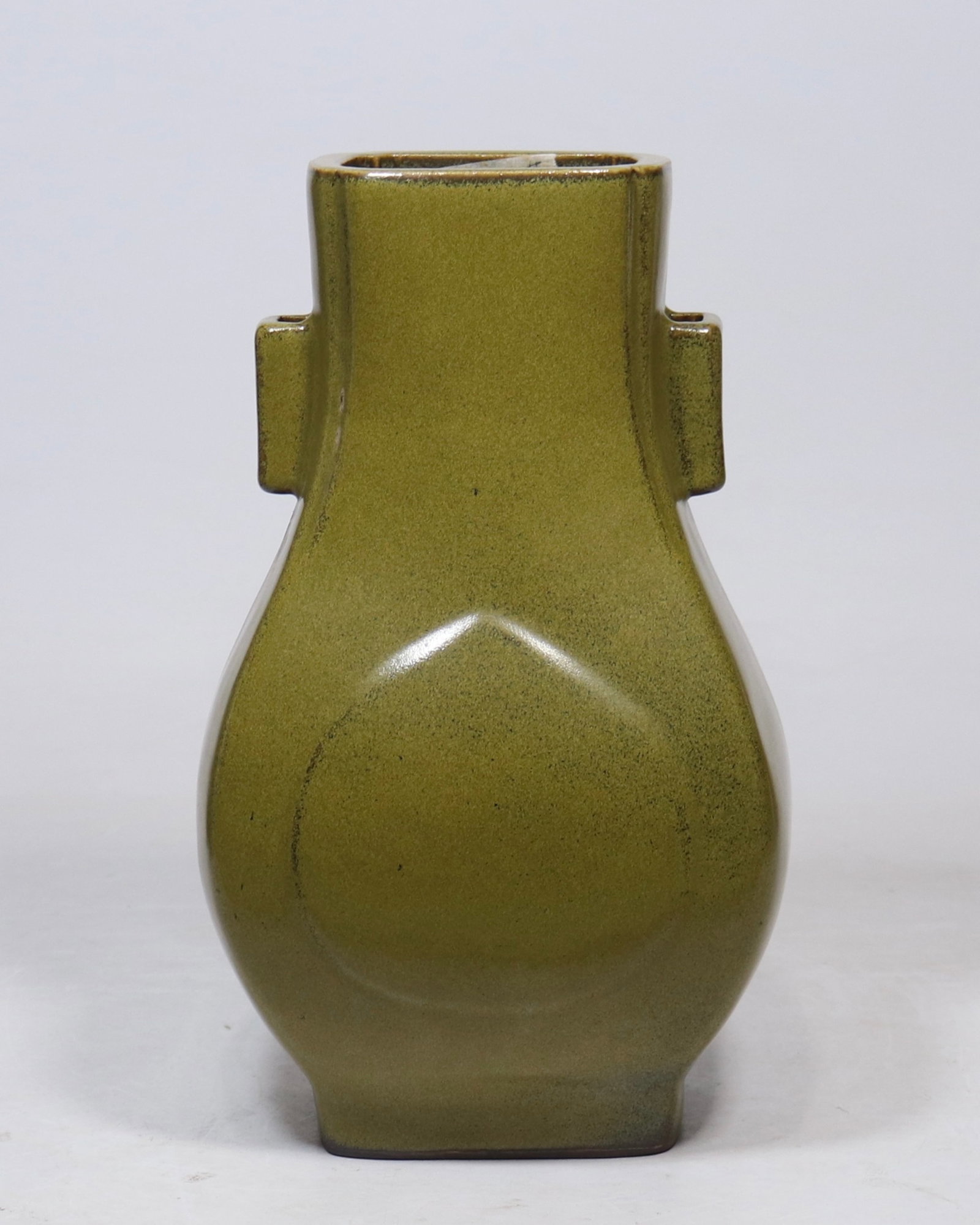 A Rare Teadust Glazed Double-Ears Vase: A Rare Teadust Glazed Double-Ears Vase,Qing Dynasty,China,Yongzheng Six-character Mark,Size:12.2inx4.3in 茶叶末釉双耳瓶,中国清代,Ƃ
