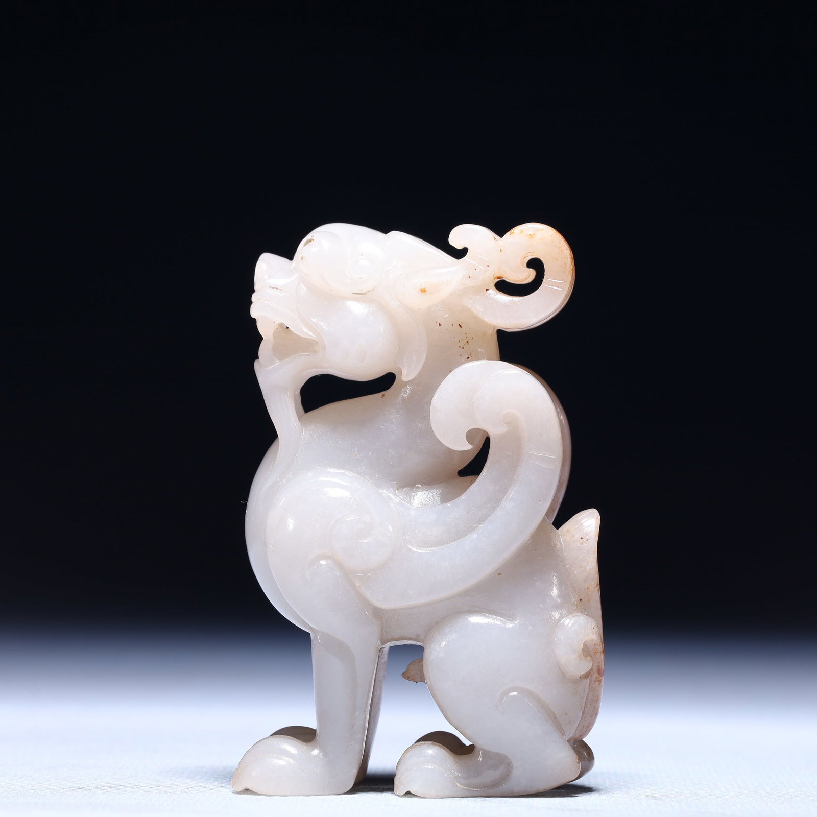 An Exquisite White Jade Beast Ornament (1 of 8)
