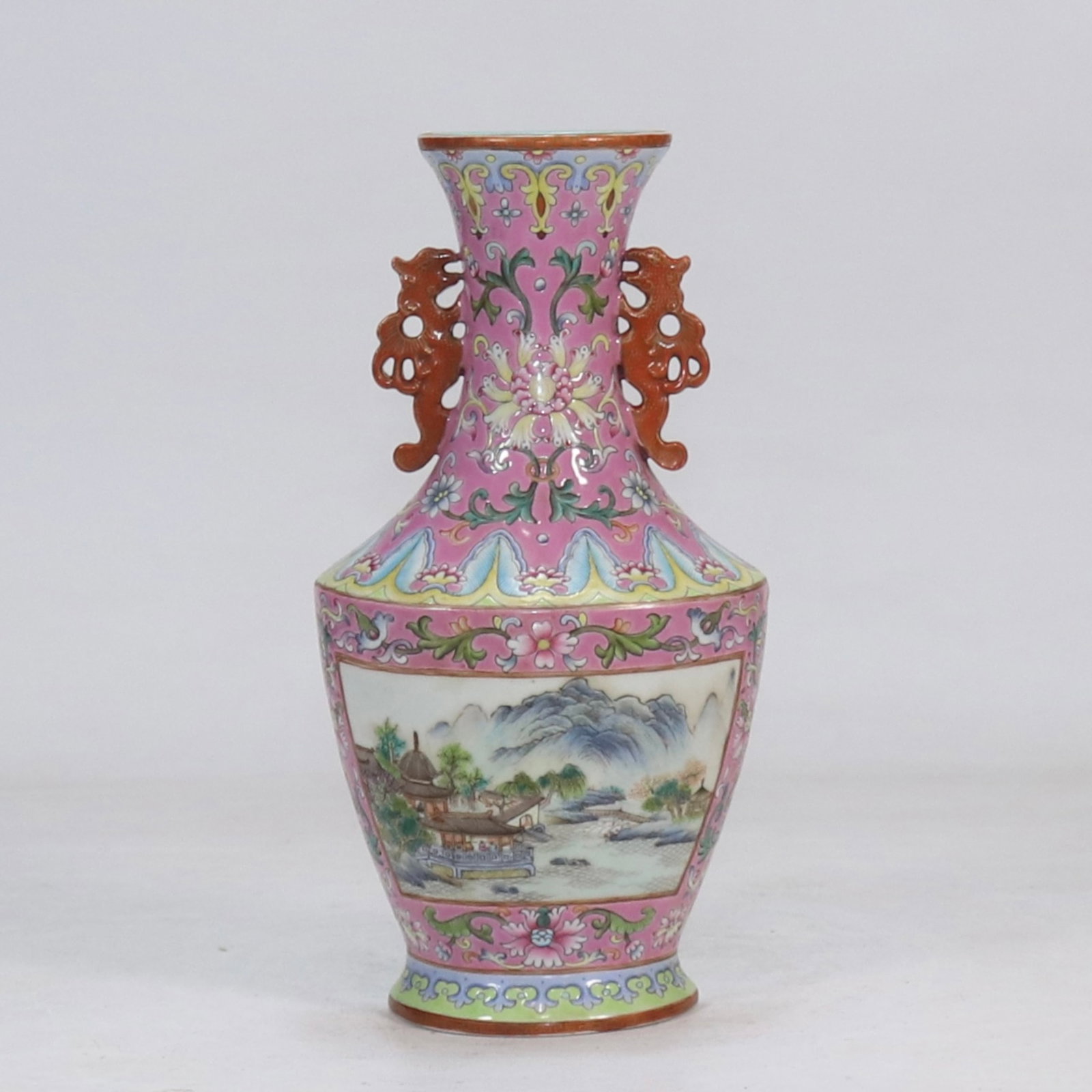 An Exquisite Ruby Red-Glazed Landscape Pattern Double-Ears Vase: An Exquisite Ruby Red-Glazed Landscape Pattern Double-Ears Vase,Qing Dynasty,China,Qianlong Six-character Mark,Size:8.2inx4.1in