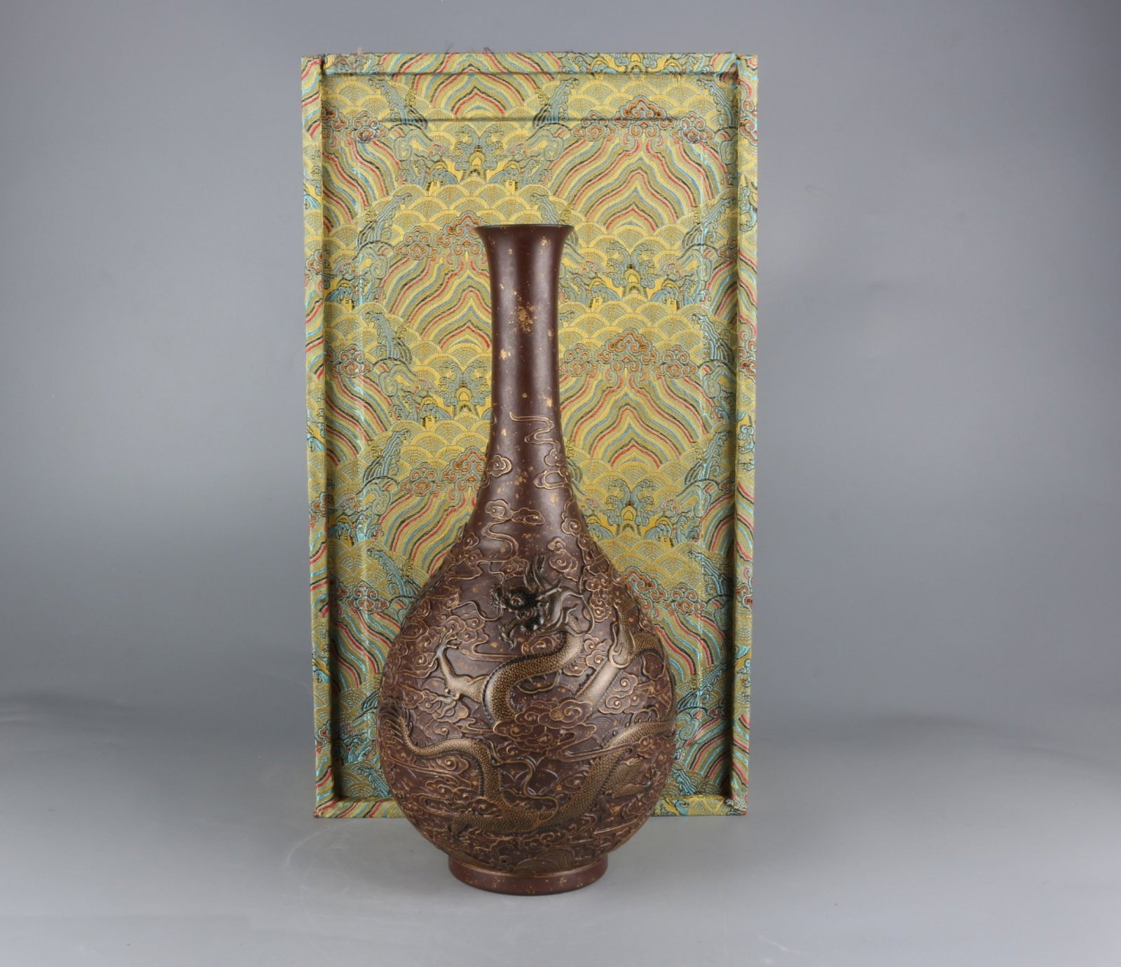 A Rare Bronze Glazed Auspicious Cloud and Dragon Pattern Vase: A Rare Bronze Glazed Auspicious Cloud and Dragon Pattern Vase,Qing Dynasty,China,Qianlong Six-character Mark,Size:13.7inx6.7in
