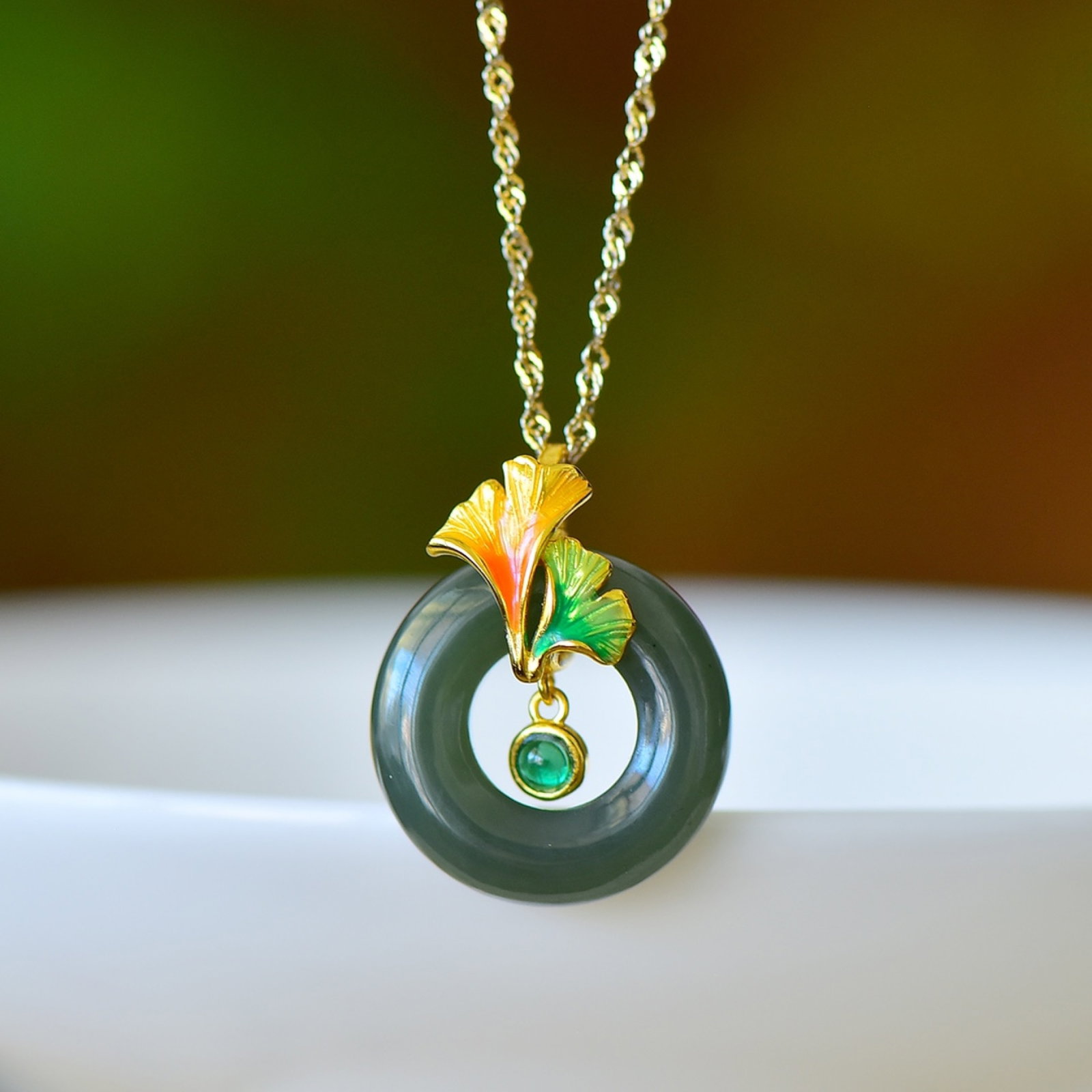 An Exquisite Sterling Silver-Gold Plated Inlaid Jasper Enamel Pendant: An Exquisite Sterling Silver-Gold Plated Inlaid Jasper Enamel Pendant,Size:0.8inx0.8in 纯银镀金镶碧玉珐琅吊坠