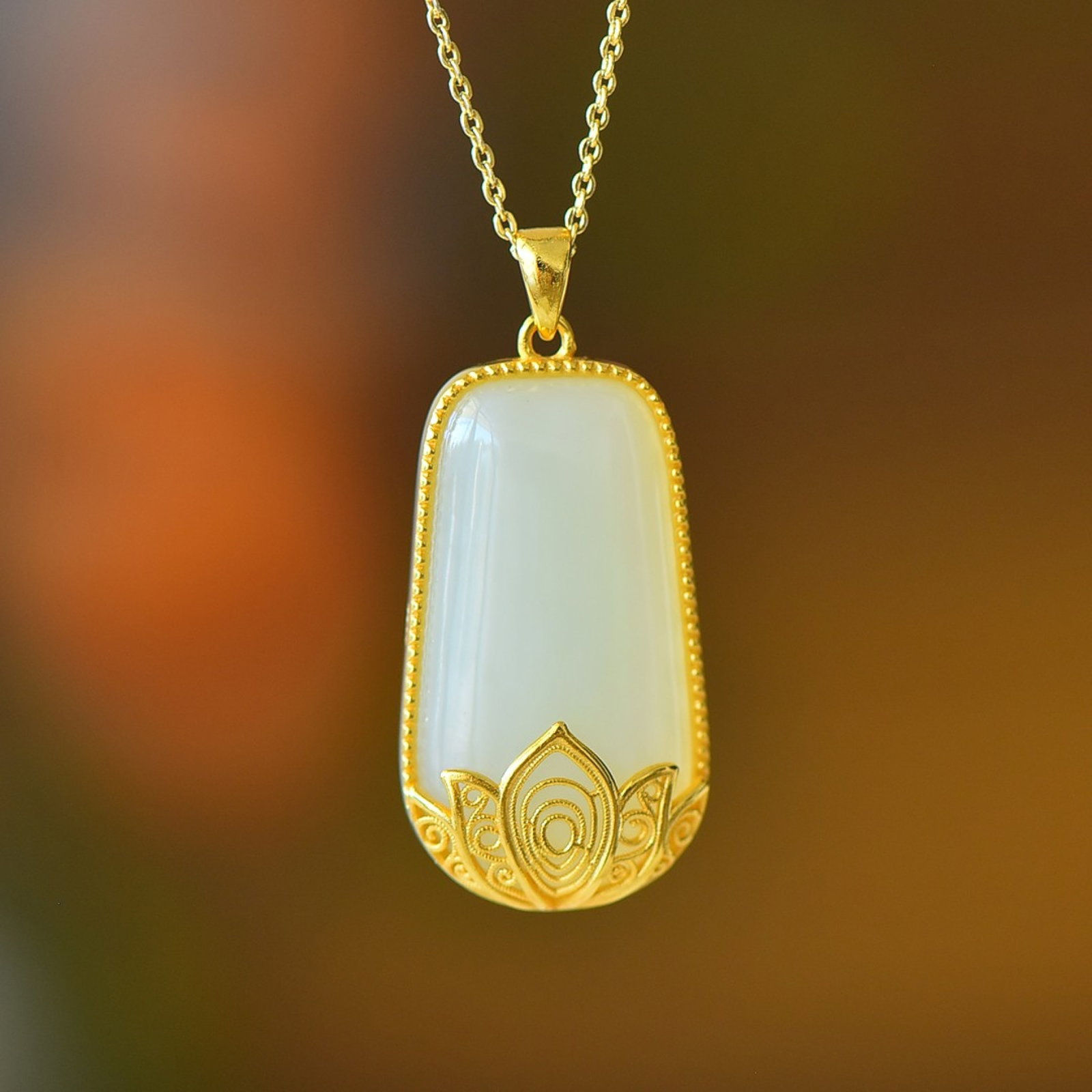 An Exquisite Sterling Silver Inlaid White Jade Lotus Pattern Necklace: An Exquisite Sterling Silver Inlaid White Jade Lotus Pattern Necklace,Size:0.6inx1.2in 纯银镶白玉莲花纹项链