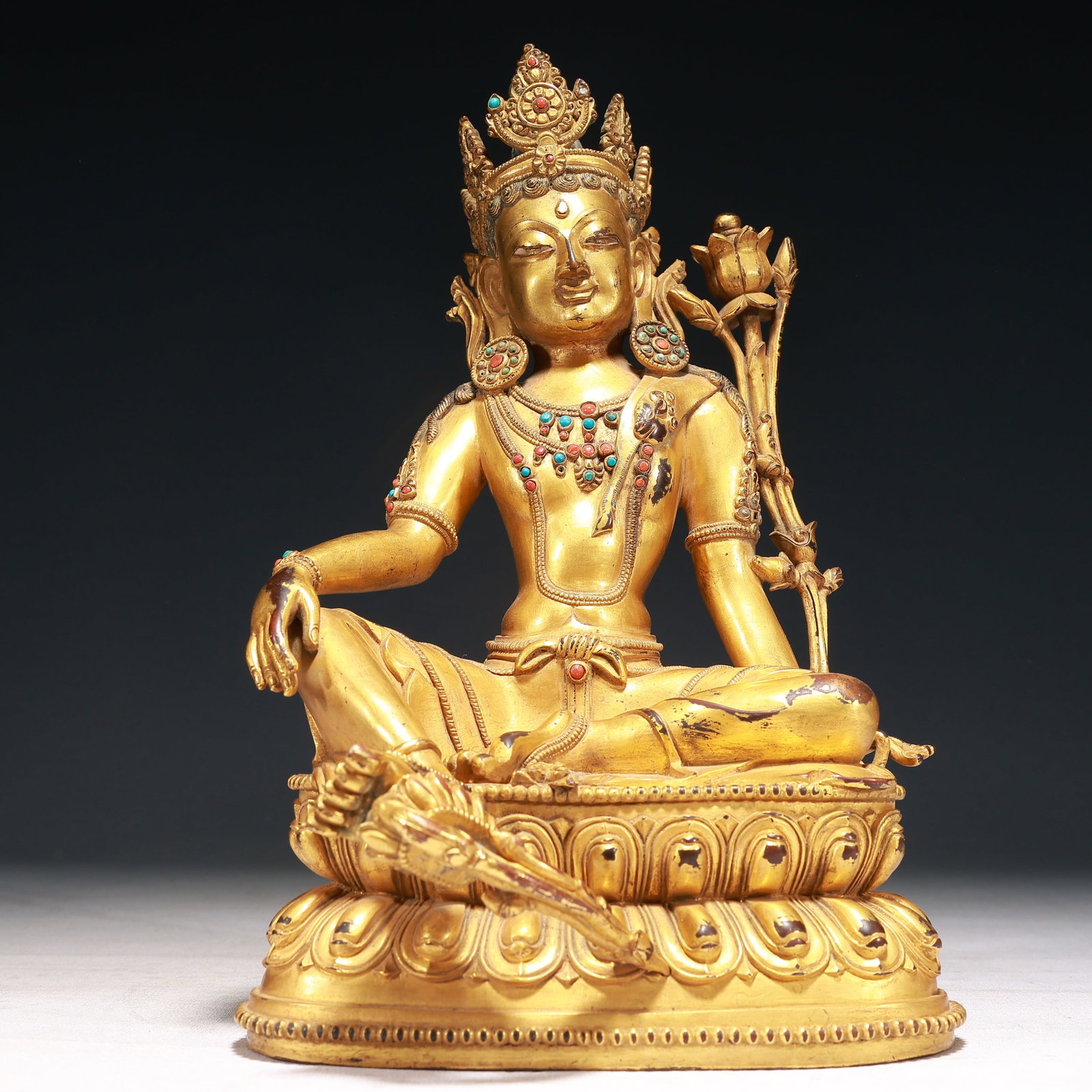 A Solemn Gilt Bronze Statue of Tara,Inlaid Turquoise: A Solemn Gilt Bronze Statue of Tara,Inlaid Turquoise,Qing Dynasty,China,Size:7.5inx5.9inx12.2in,Weight:5050g 铜鎏金度母像,嵌绿松石,中&