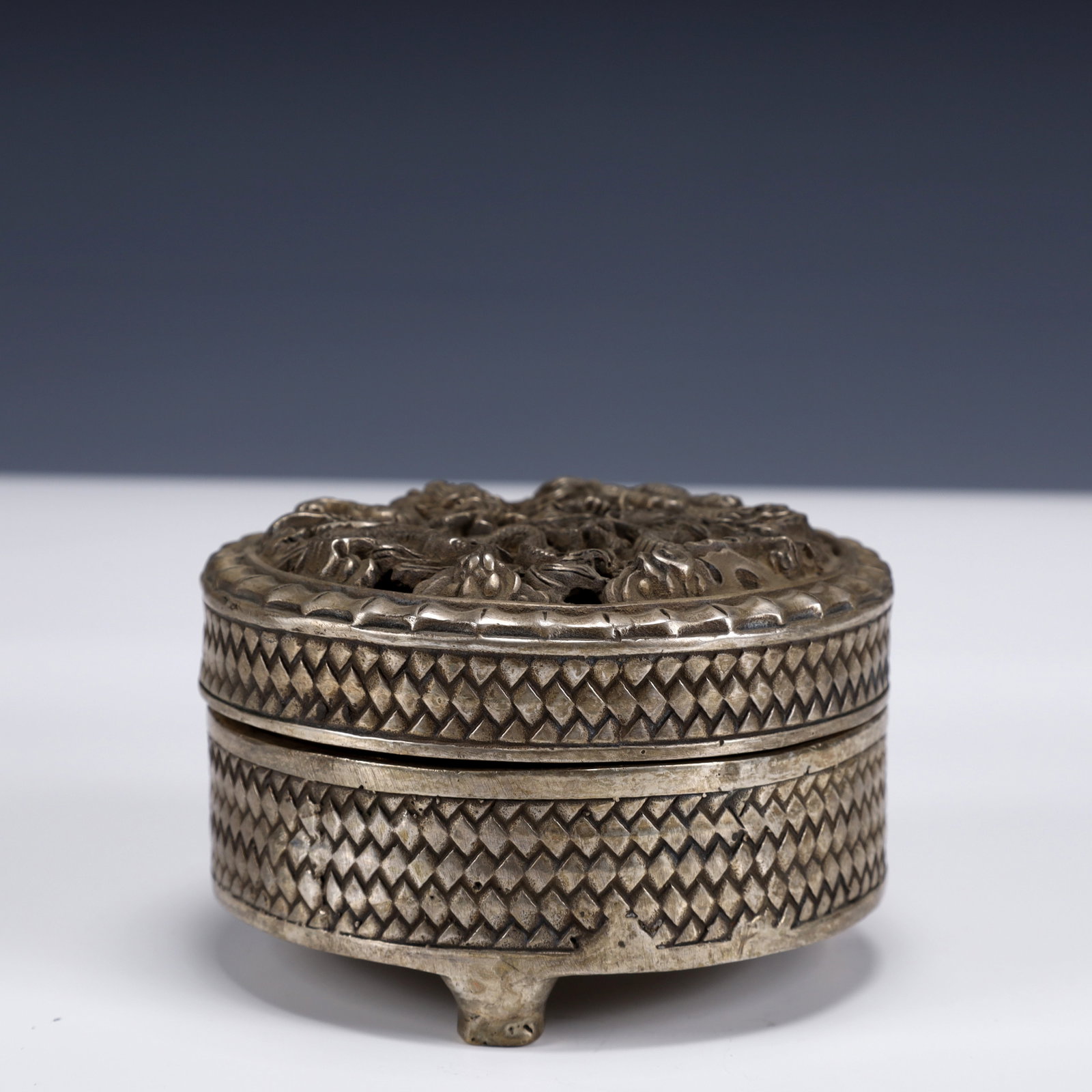 An Exquisite Silver-Plated Bronze Dragon Pattern Tripod Censer: An Exquisite Silver-Plated Bronze Dragon Pattern Tripod Censer ,Qing Dynasty, China,With Mark,Size:4.3inx4.3inx2.8in,Weight:700g 铜镀银龙纹三足香炉