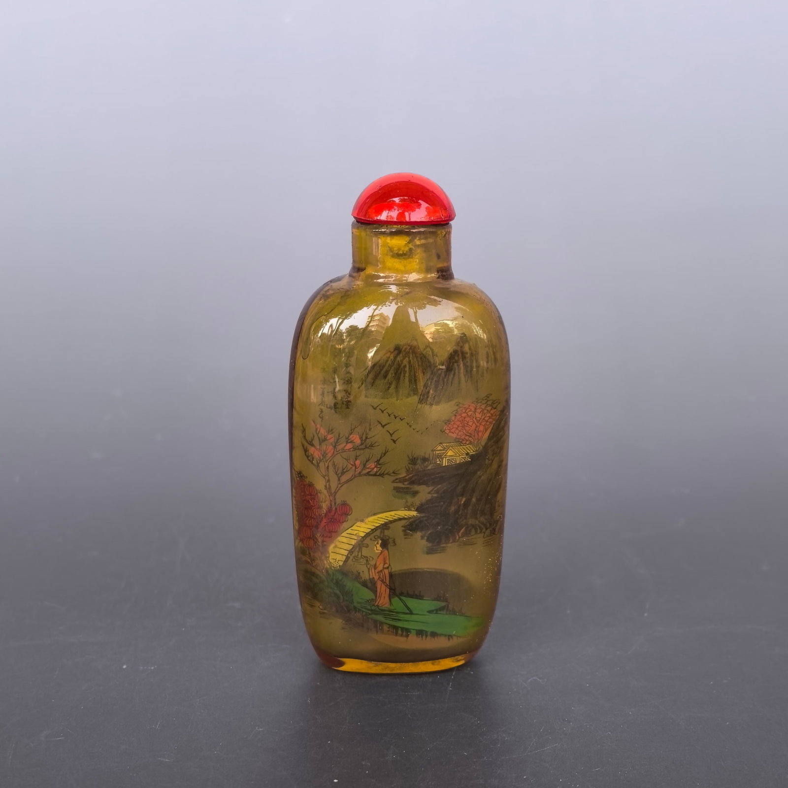 An Exquisite Glass Landscape and Figure Pattern Snuff Bottle: An Exquisite Glass Landscape and Figure Pattern Snuff Bottle,Qing Dynasty,China,Size:1.6inx1inx3.5in,Weight:59g 琉璃山水人物纹鼻烟壶,中