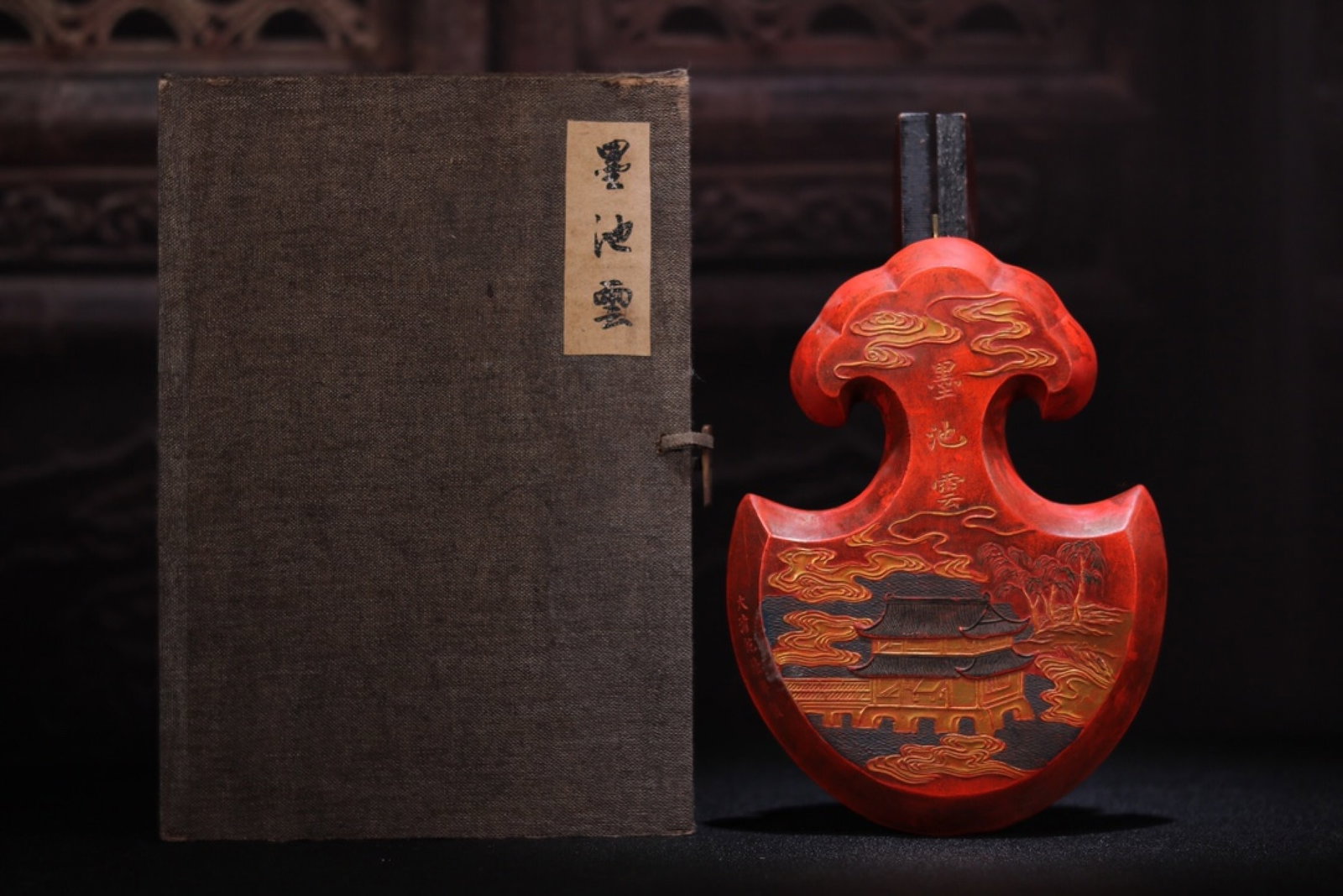 An Exquisite Cinnabar Landscape Pattern Ornament: An Exquisite Cinnabar Landscape Pattern Ornament,Qing Dynasty,China,Qianlong Six-character Mark,Size:7.5inx5.5inx1.2in,Weight:909g 朱砂山水纹摆件,中