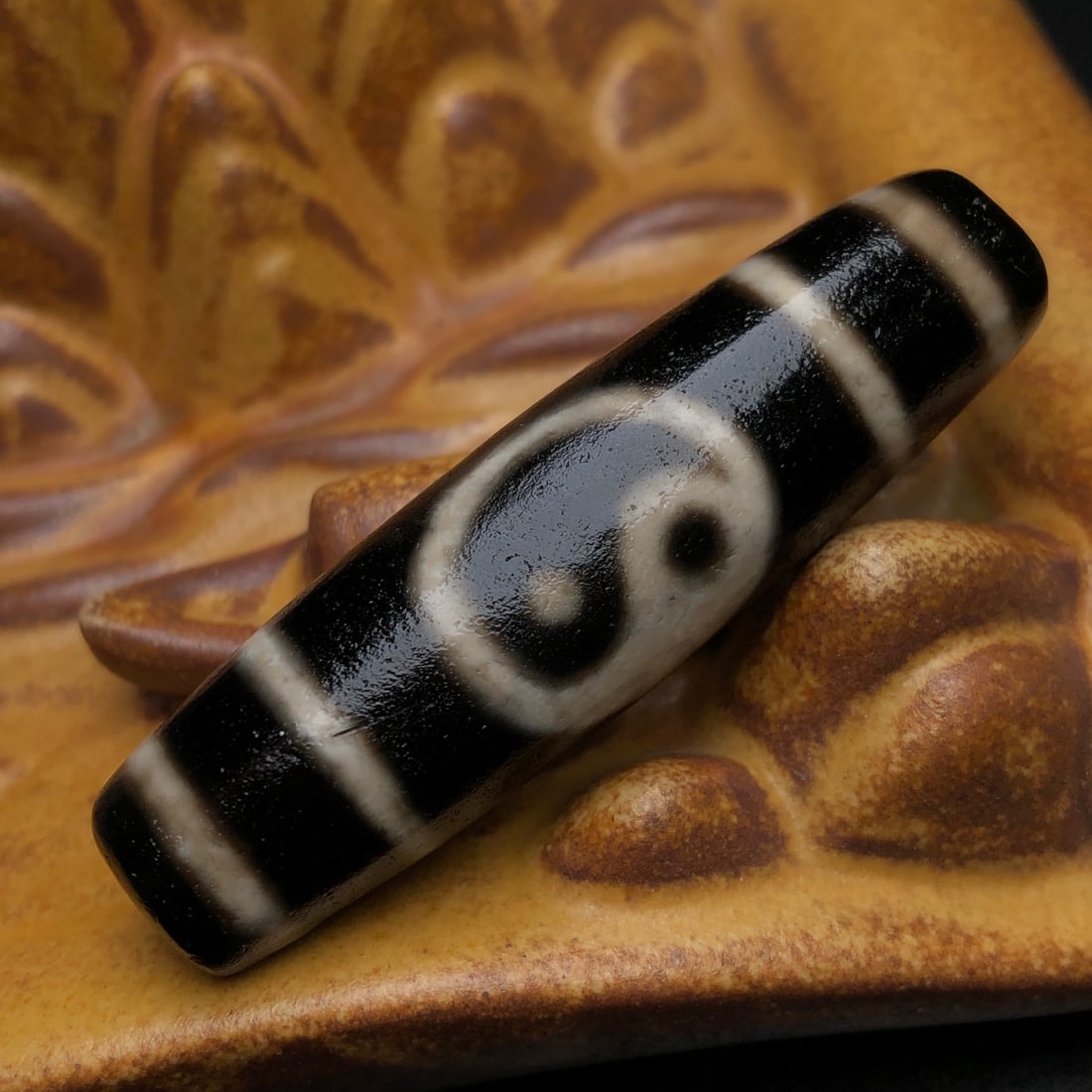 An Exquisite Old Material Bagua Dzi Bead: An Exquisite Old Material Bagua Dzi Bead. Rich oily patina, clear and smooth totem, mellow coating. Size: 54mm×15mm; weight: 19.4g.